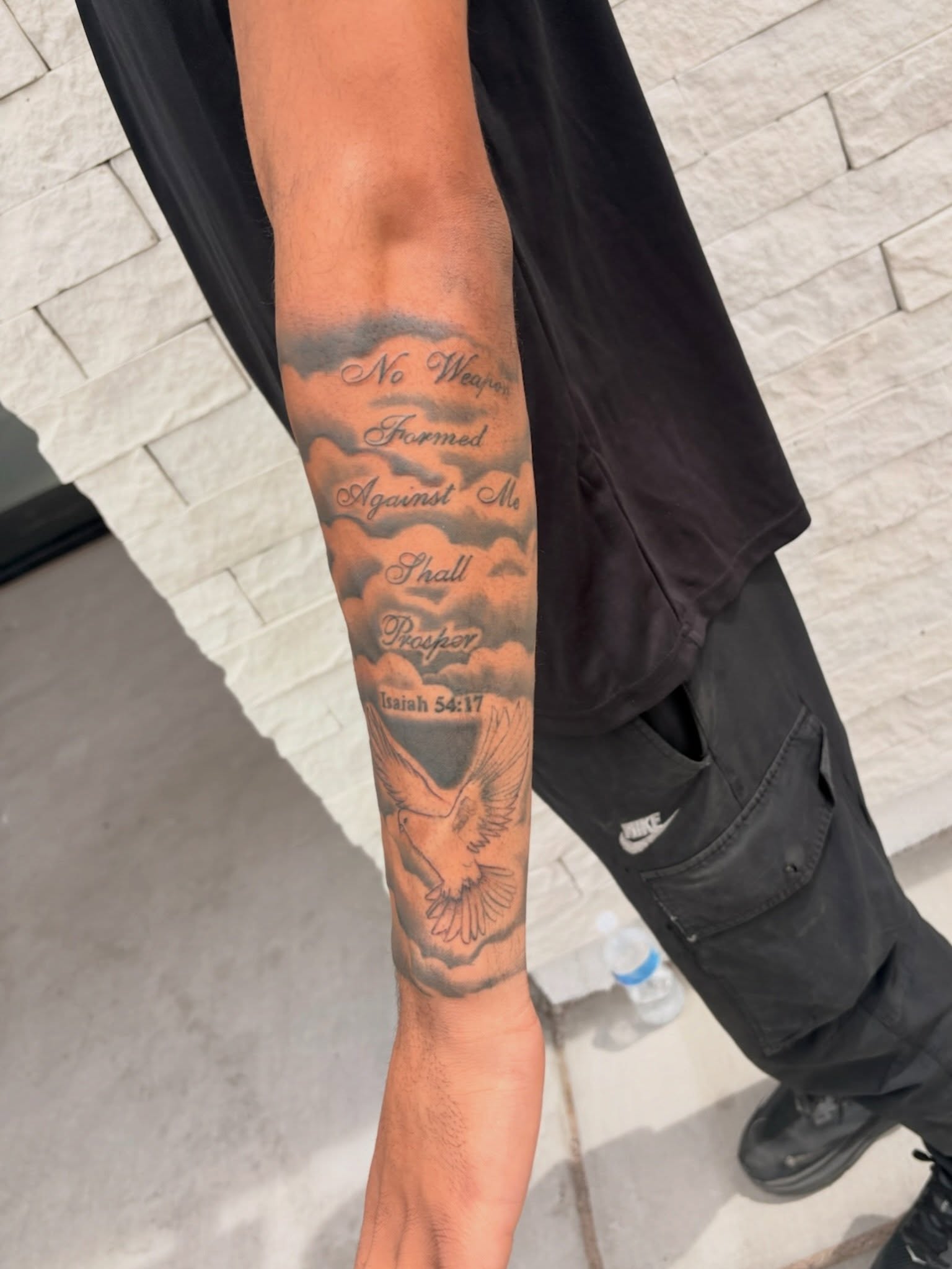 Dove and clouds black and grey tattoo on the forearm by tati 🇬🇺🇵🇭