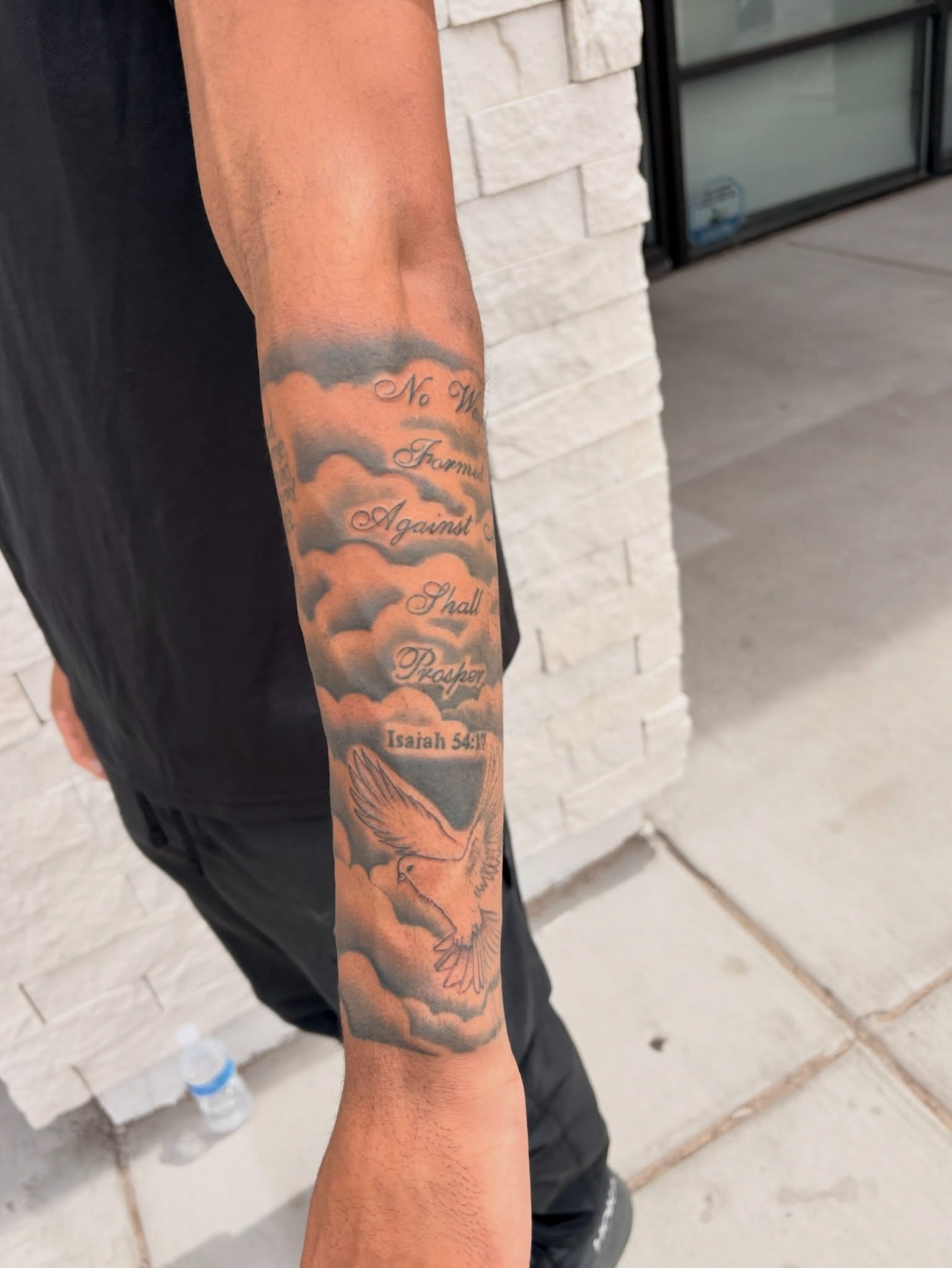 Dove and clouds black and grey tattoo on the forearm by tati 🇬🇺🇵🇭
