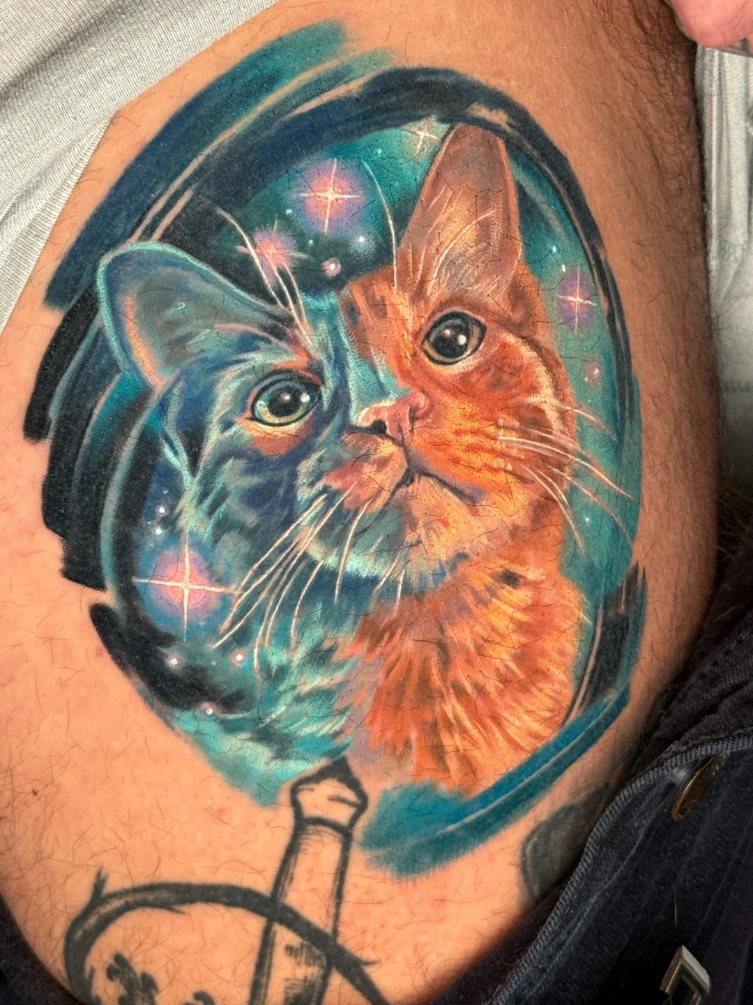 Cat realism tattoo on the thigh by Amy Zager