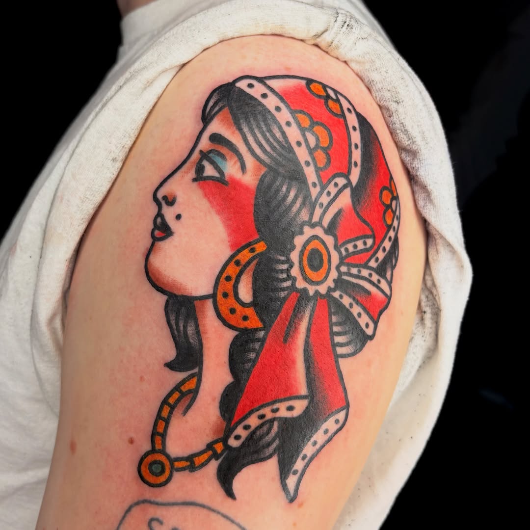Woman profile American traditional tattoo on the shoulder by Braedon 🎱