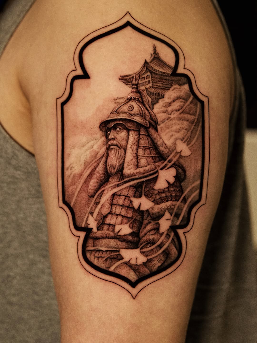 Samurai warrior and temple realism tattoo on the thigh by Ray Quinday