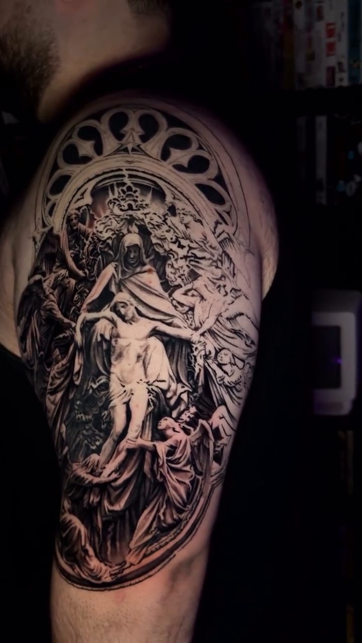 Gothic angel with ornate halo realism tattoo on the shoulder by Tommy Nguyen, Eastpointe, Michigan