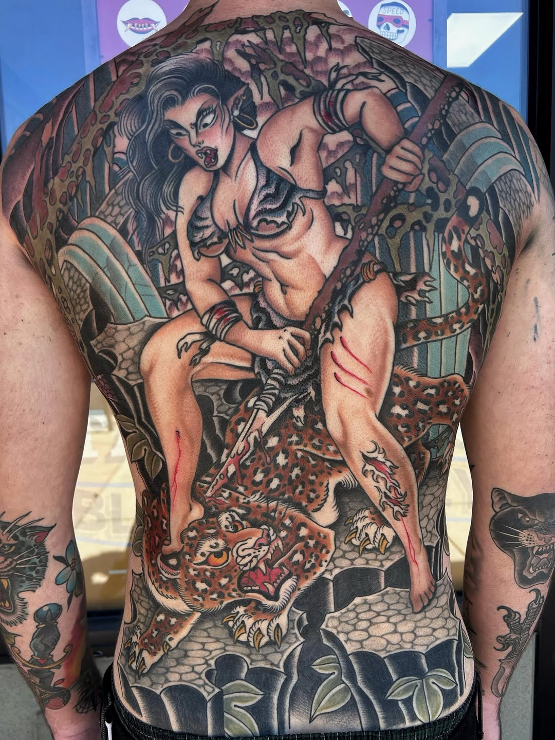 Woman fighting a leopard Japanese tattoo on the back by Jade McKenzie, Temecula, California