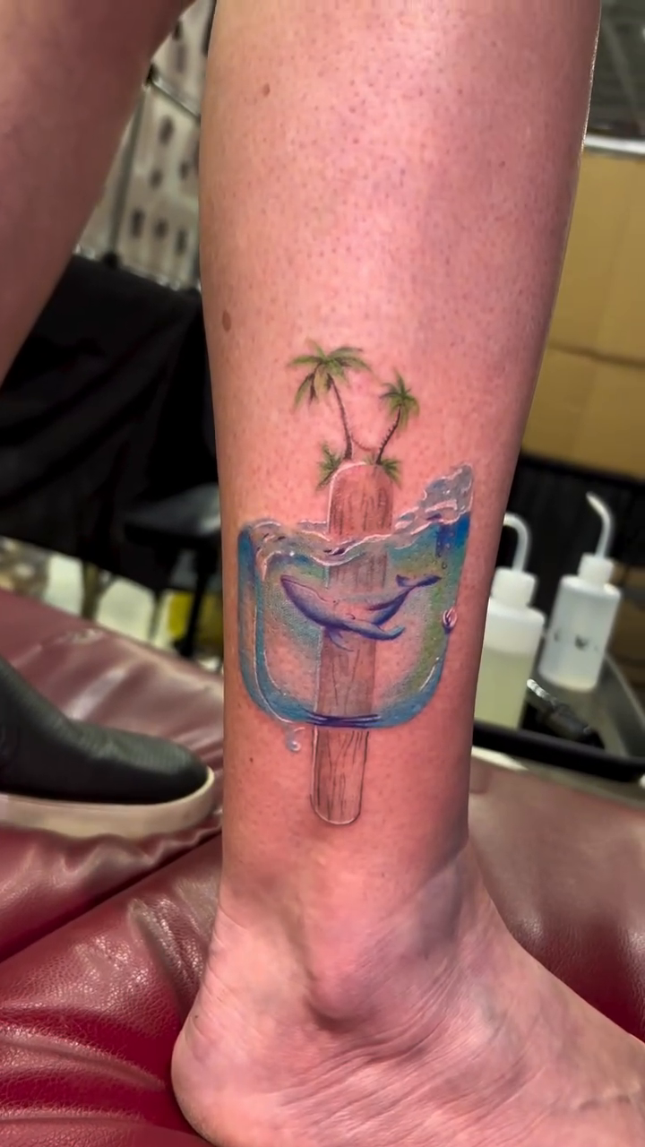 Popsicle with palm trees and ocean new school tattoo by Serendipity Tattoos