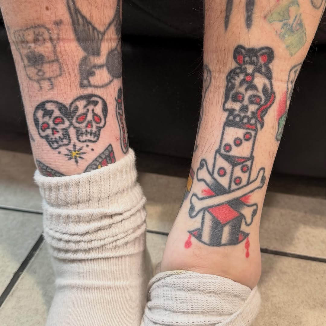 Dice and skull American traditional tattoo on the calf by Max mogstad