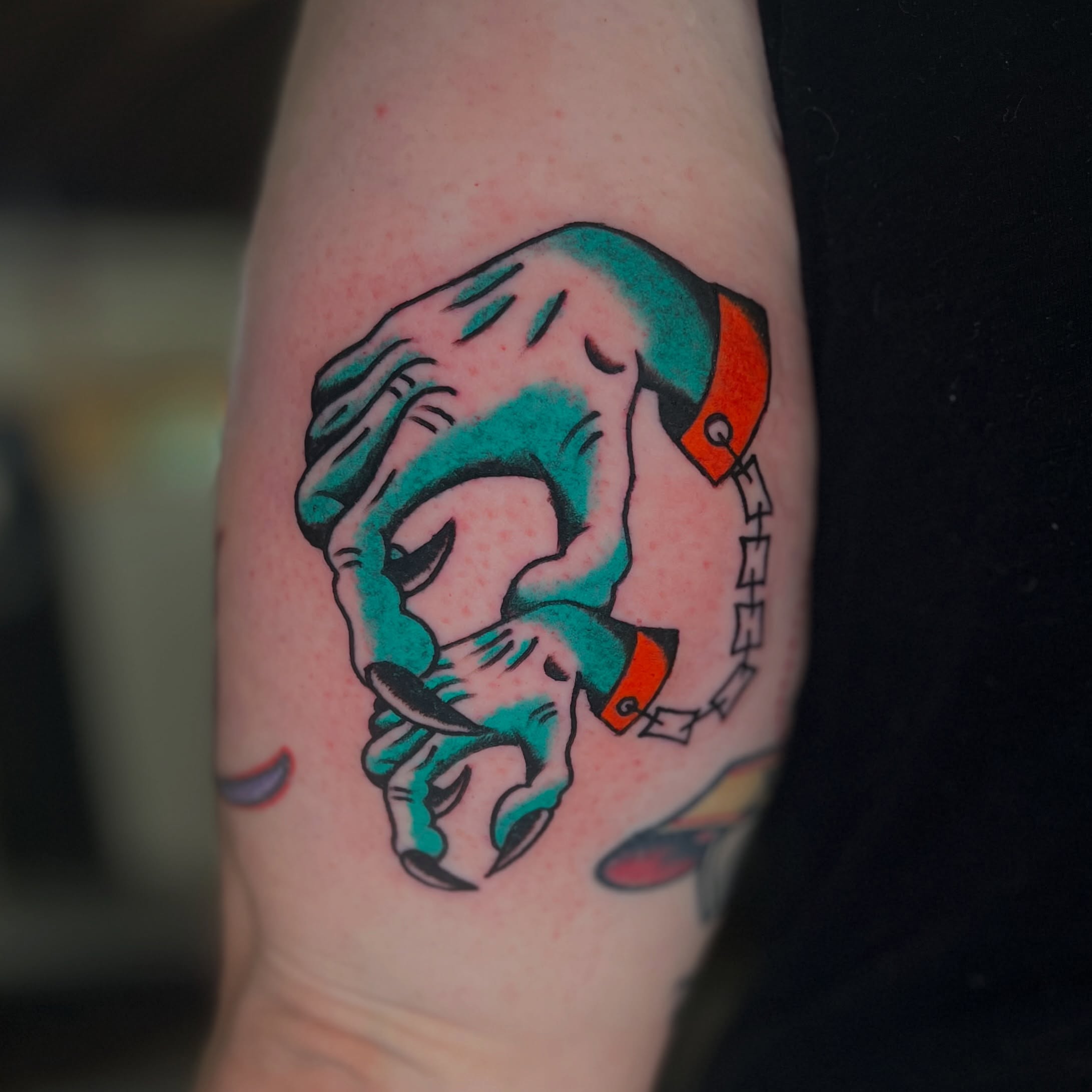 Dog American traditional tattoo on the forearm by Andrew Storm