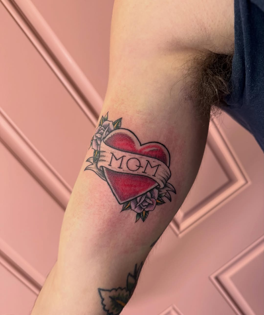 Heart with ribbon American traditional tattoo on the forearm by Jennylee Aerts, Asbury Park, New Jersey