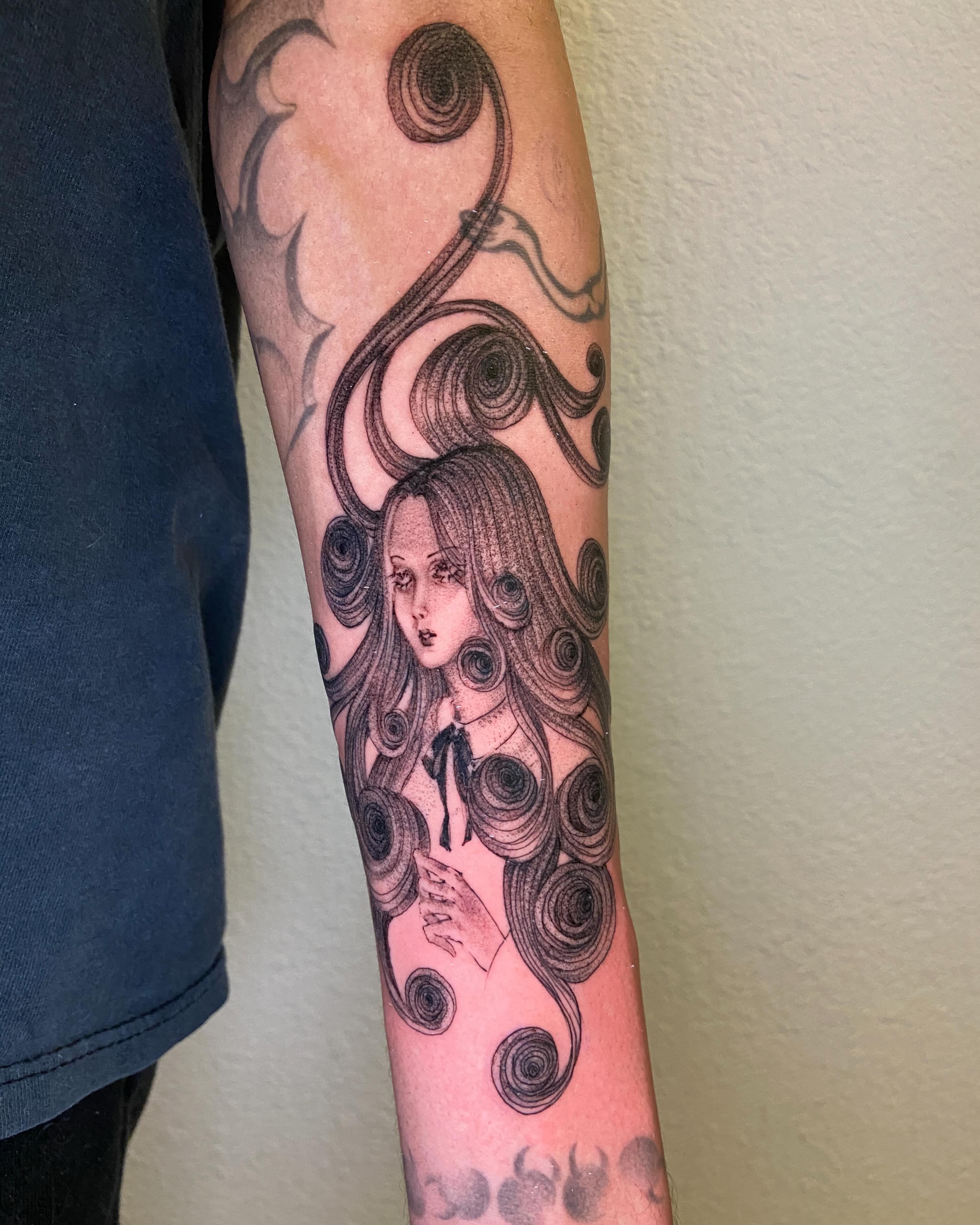 Woman with swirling hair surrealism tattoo on the forearm by ༒ ₐₙ𝓰ₑₗₐ  ༒
