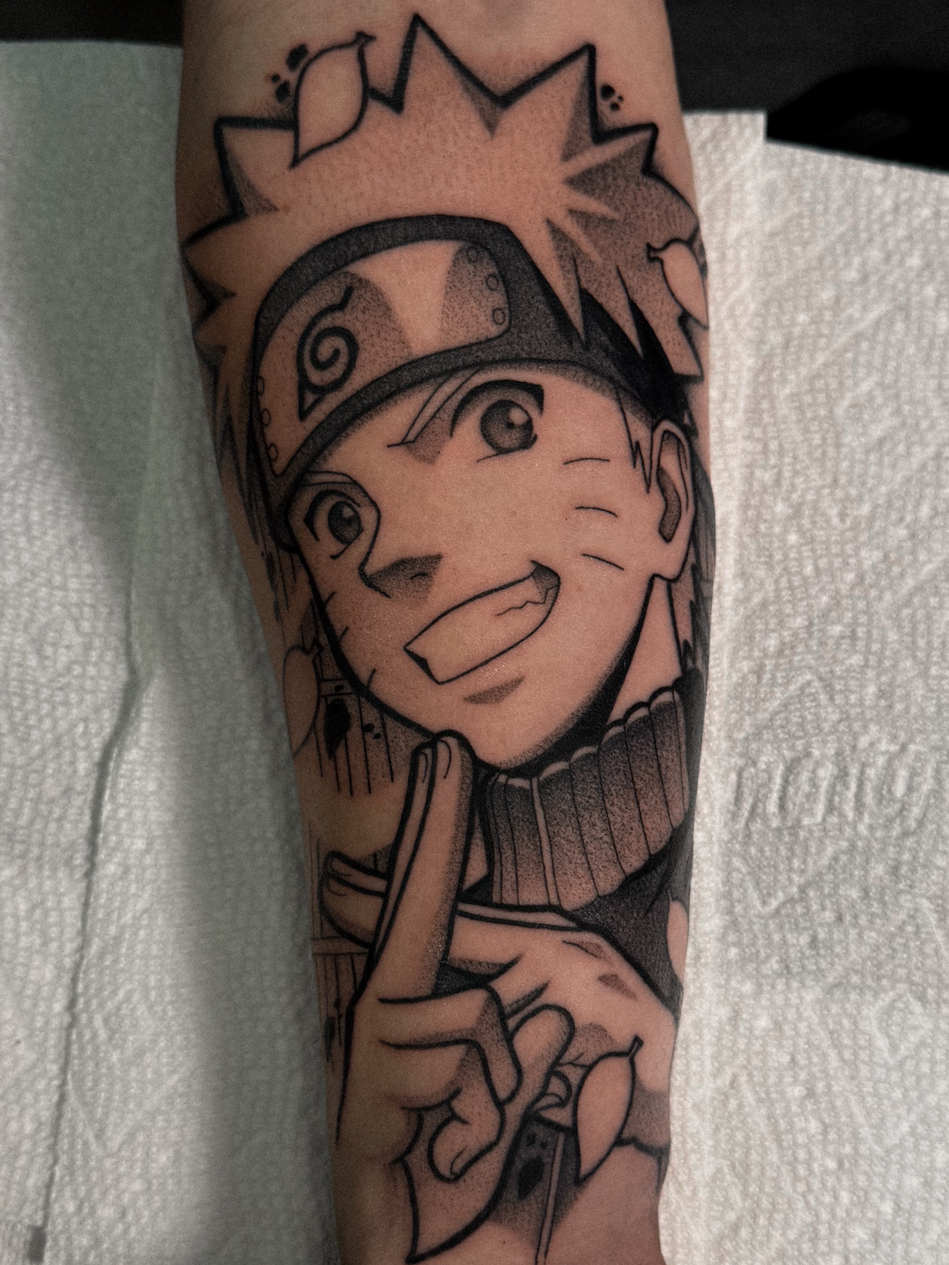 Naruto anime tattoo on the forearm by Yakir, Houston, Texas