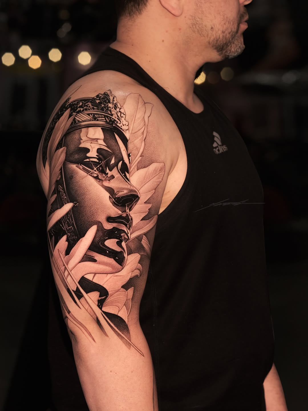 Realism tattoo on the upper arm by Ke$la