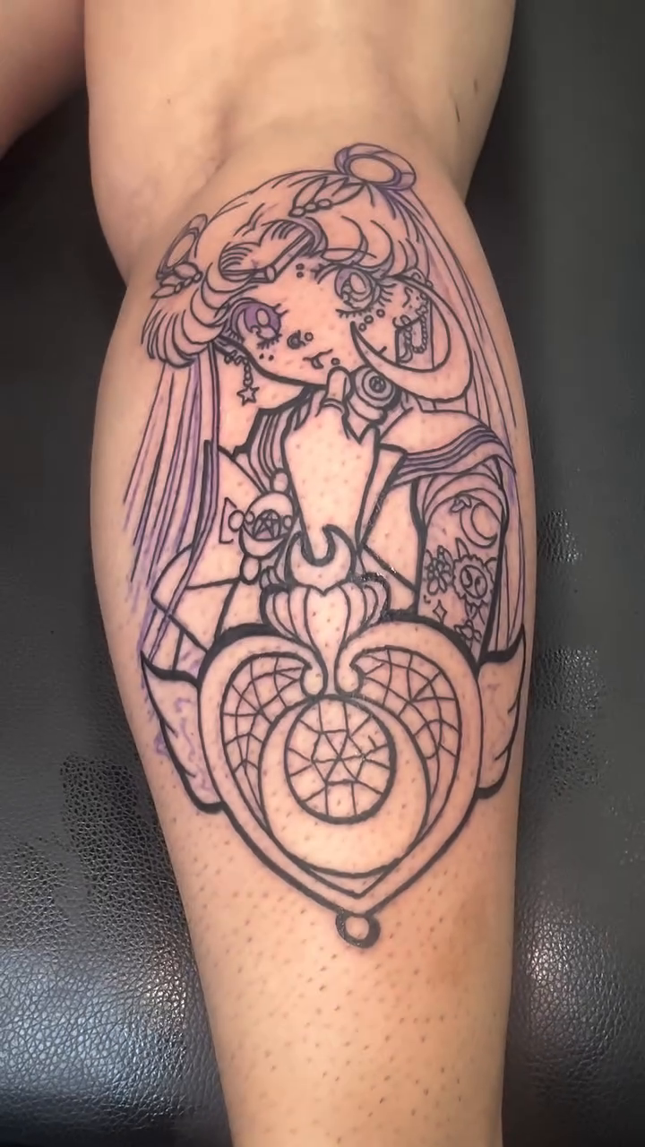 Sailor Moon character with locket realism tattoo on the forearm by Brian J Baker, Atlanta, Georgia
