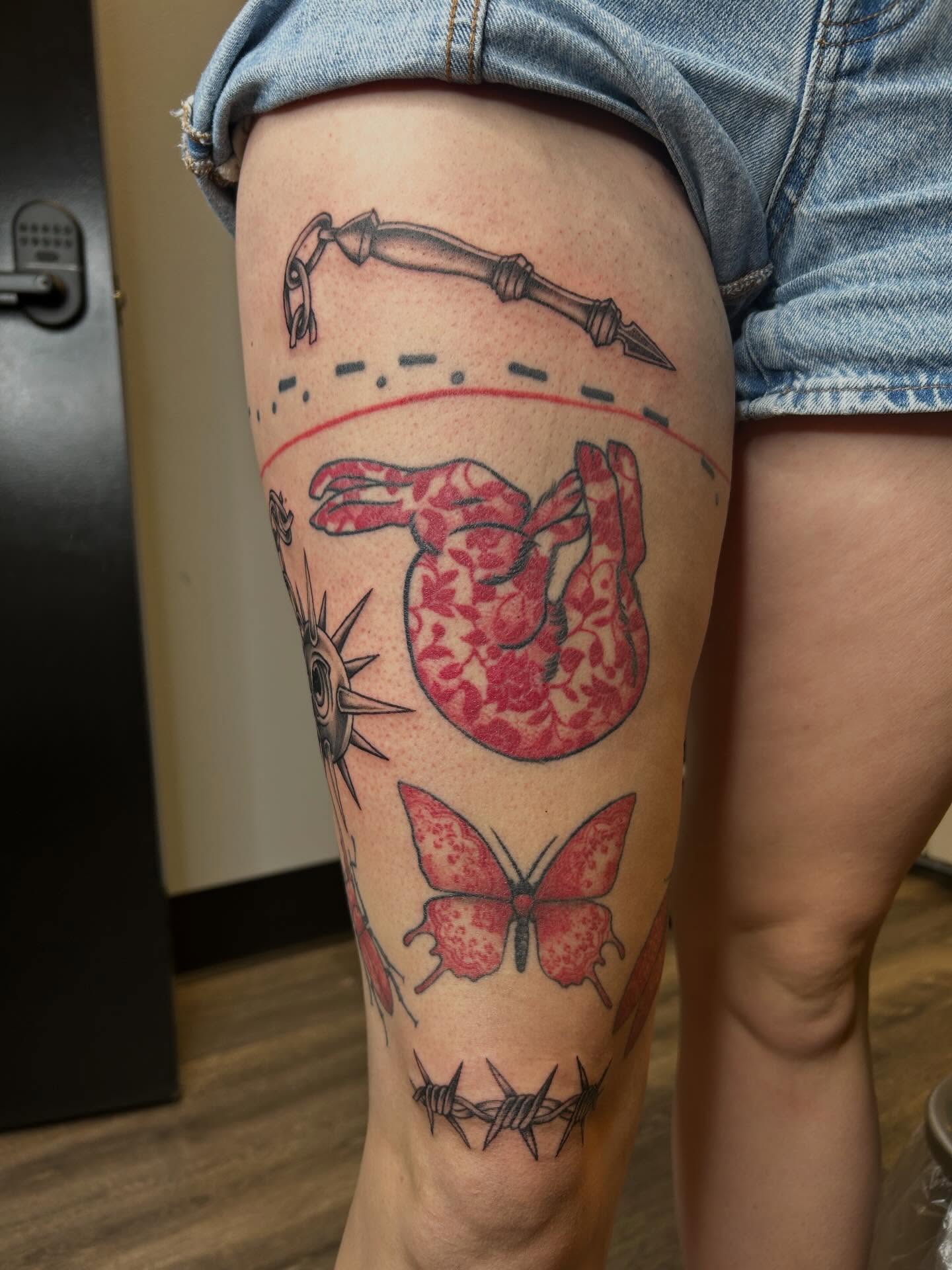 Heart with floral pattern neo-traditional tattoo on the thigh by Janelle McCarthy