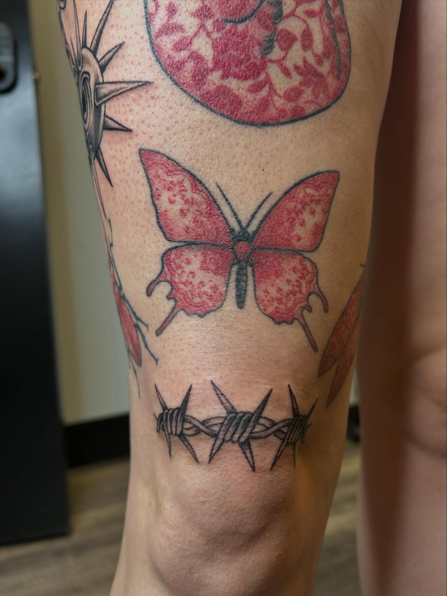 Butterfly American traditional tattoo on the forearm by Janelle McCarthy