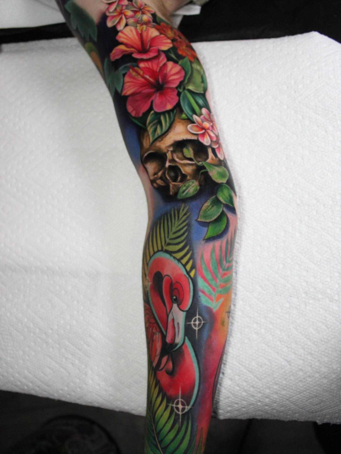Floral skull American traditional tattoo on the forearm by πΆππ πΎππππππ