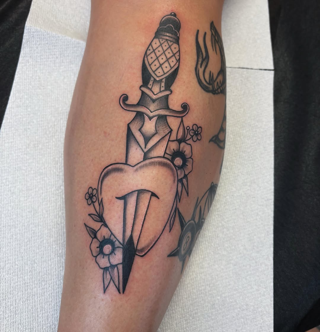 Knife and heart American traditional tattoo on the forearm by Demi Flores 🖤