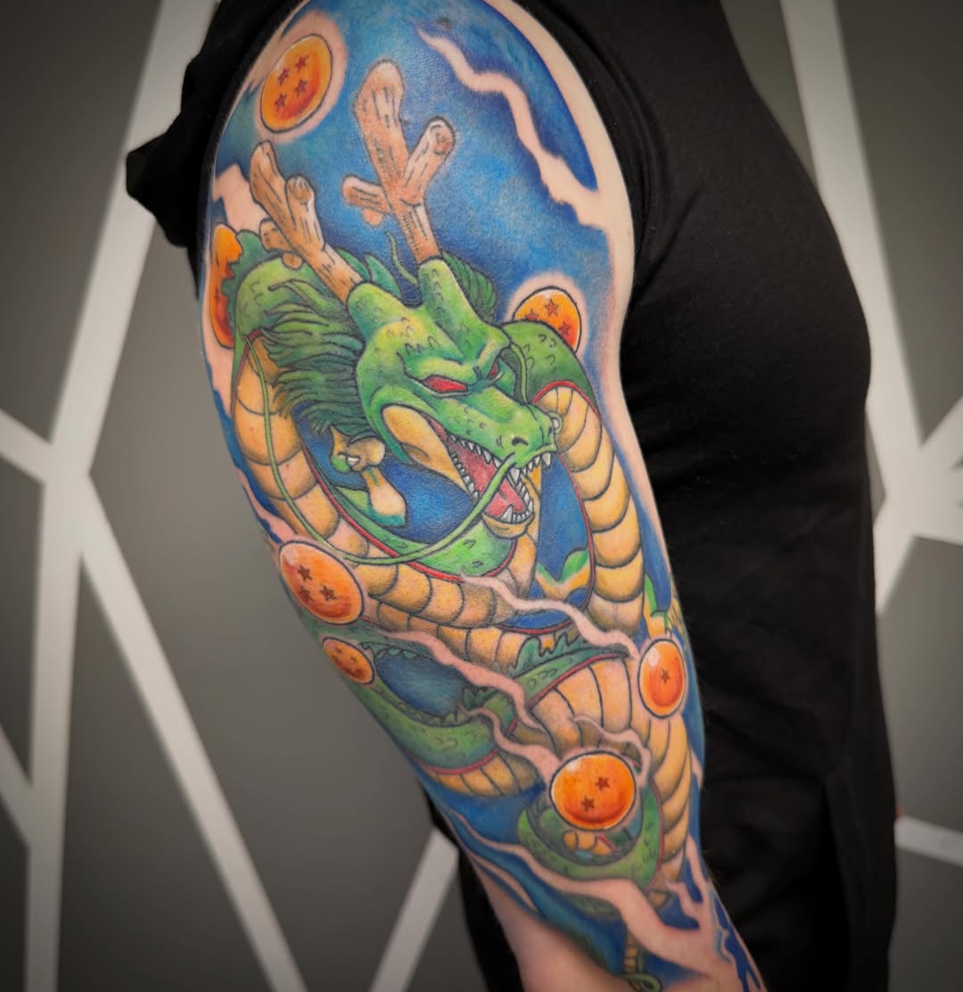 Dragon ball z dragon dotwork tattoo on the upper arm by Katie Rojas