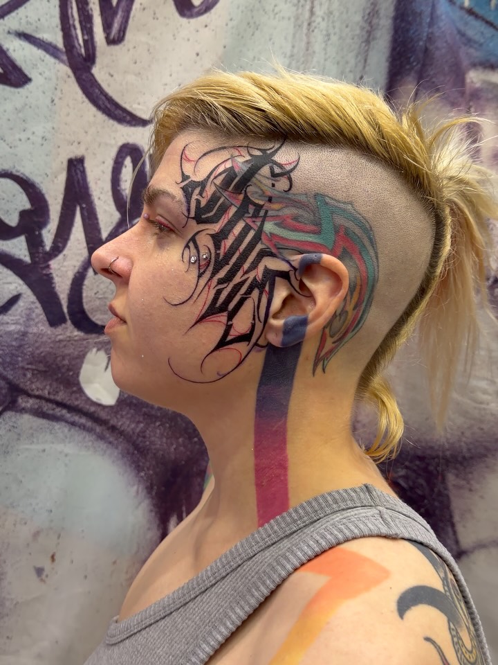 Abstract design tattoo on the head by Martin Melendrez