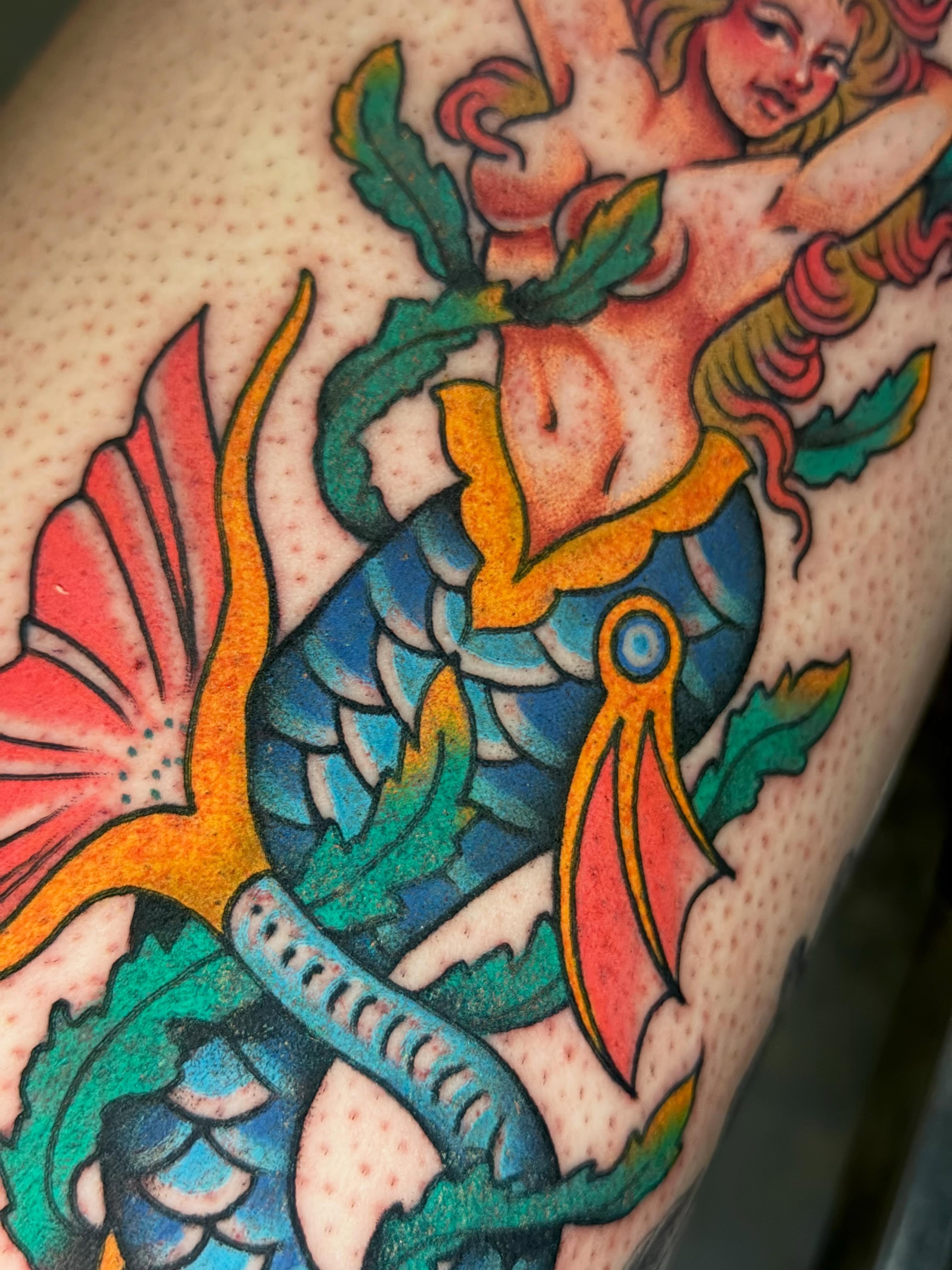 Mermaid American traditional tattoo on the thigh by Holli Marie