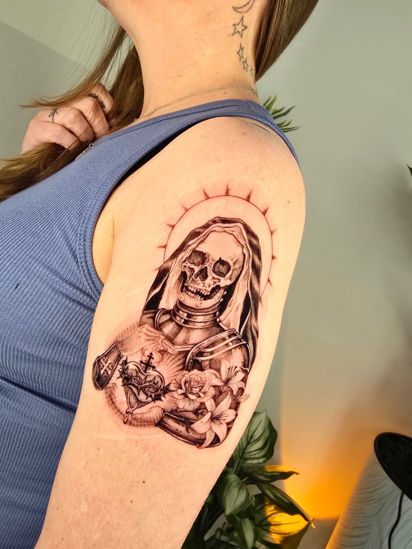 Skeleton in robe realism tattoo on the shoulder by Scribbles (Teala René), Charlotte, North Carolina