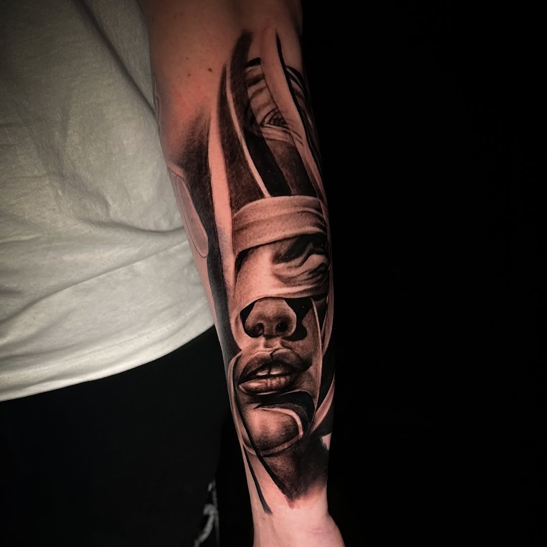 Blindfolded face realism tattoo on the forearm by Juan c munoz jr, Chicago, Illinois