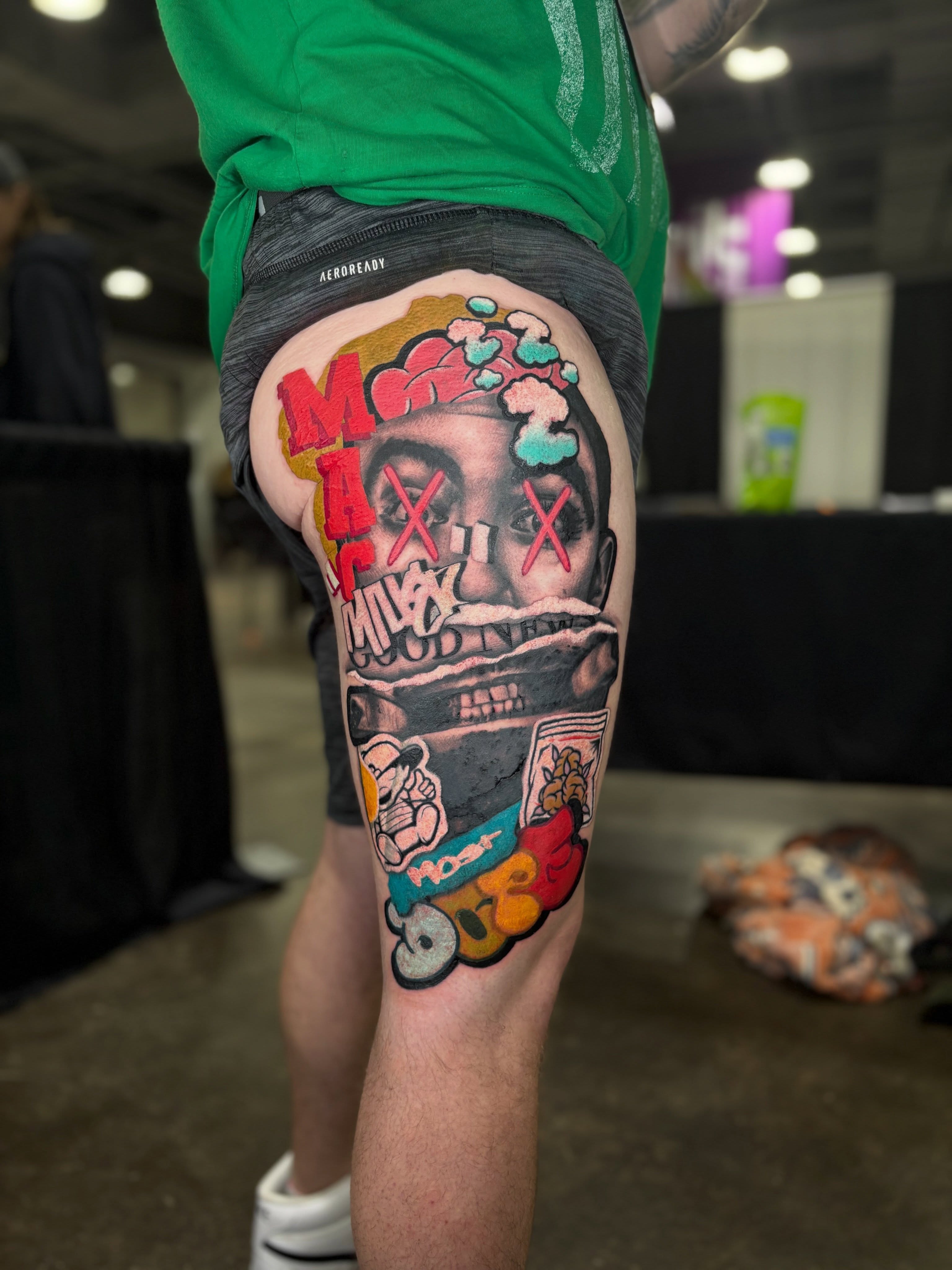 Graffiti-style portrait realism tattoo on the thigh by Brian Overholt