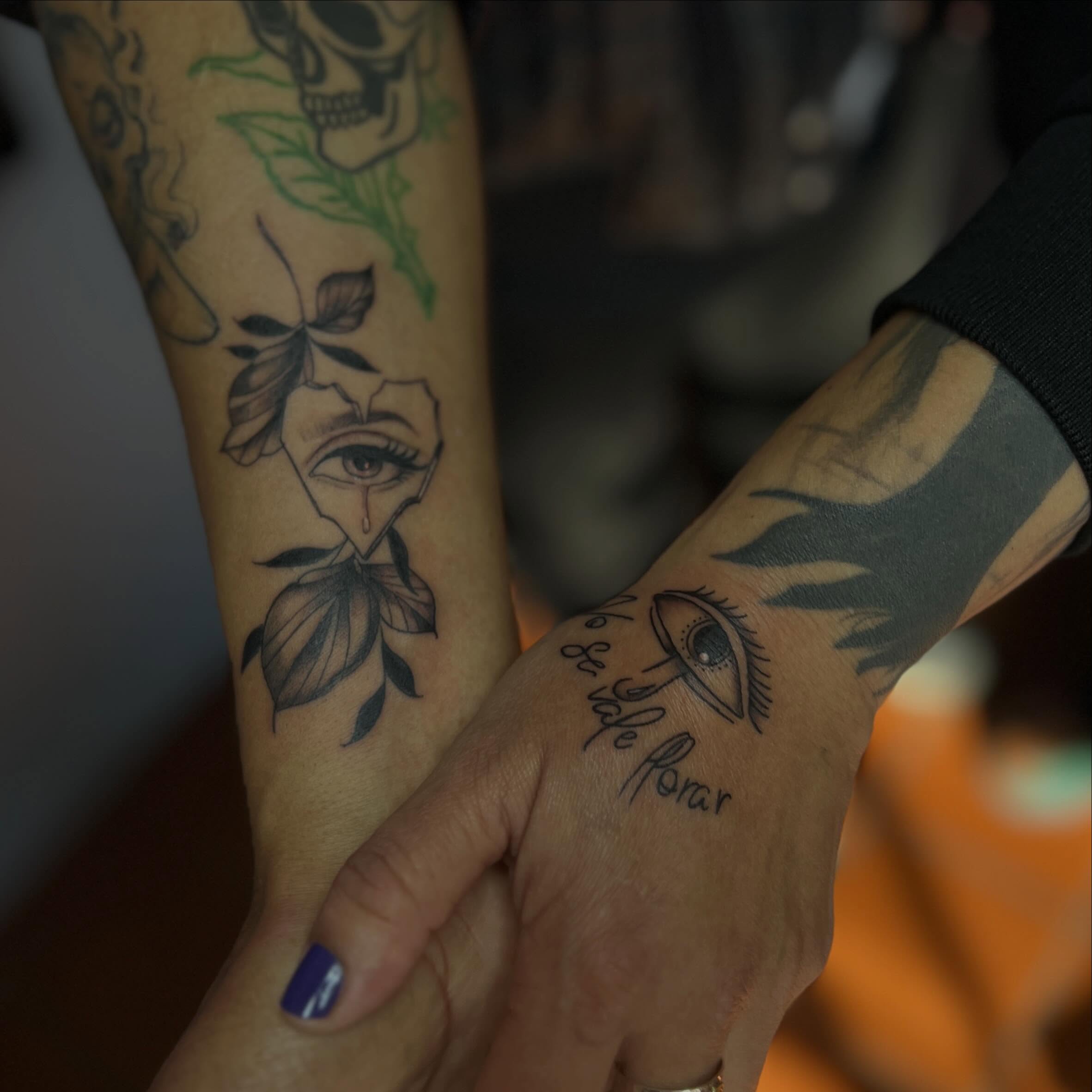 Eye and leaves black and grey tattoo on the forearm by Tattoomobile