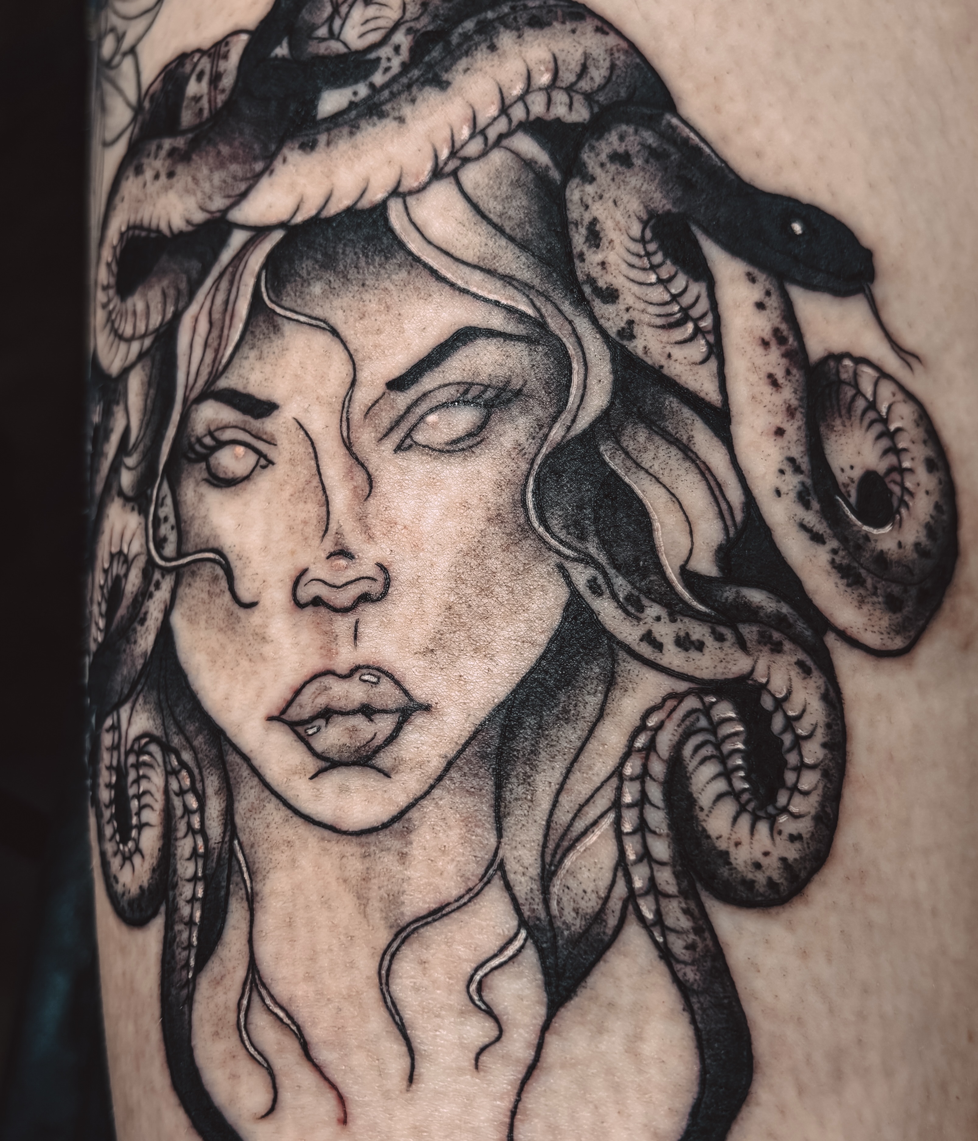 Medusa realism tattoo on the forearm by Liz Cook
