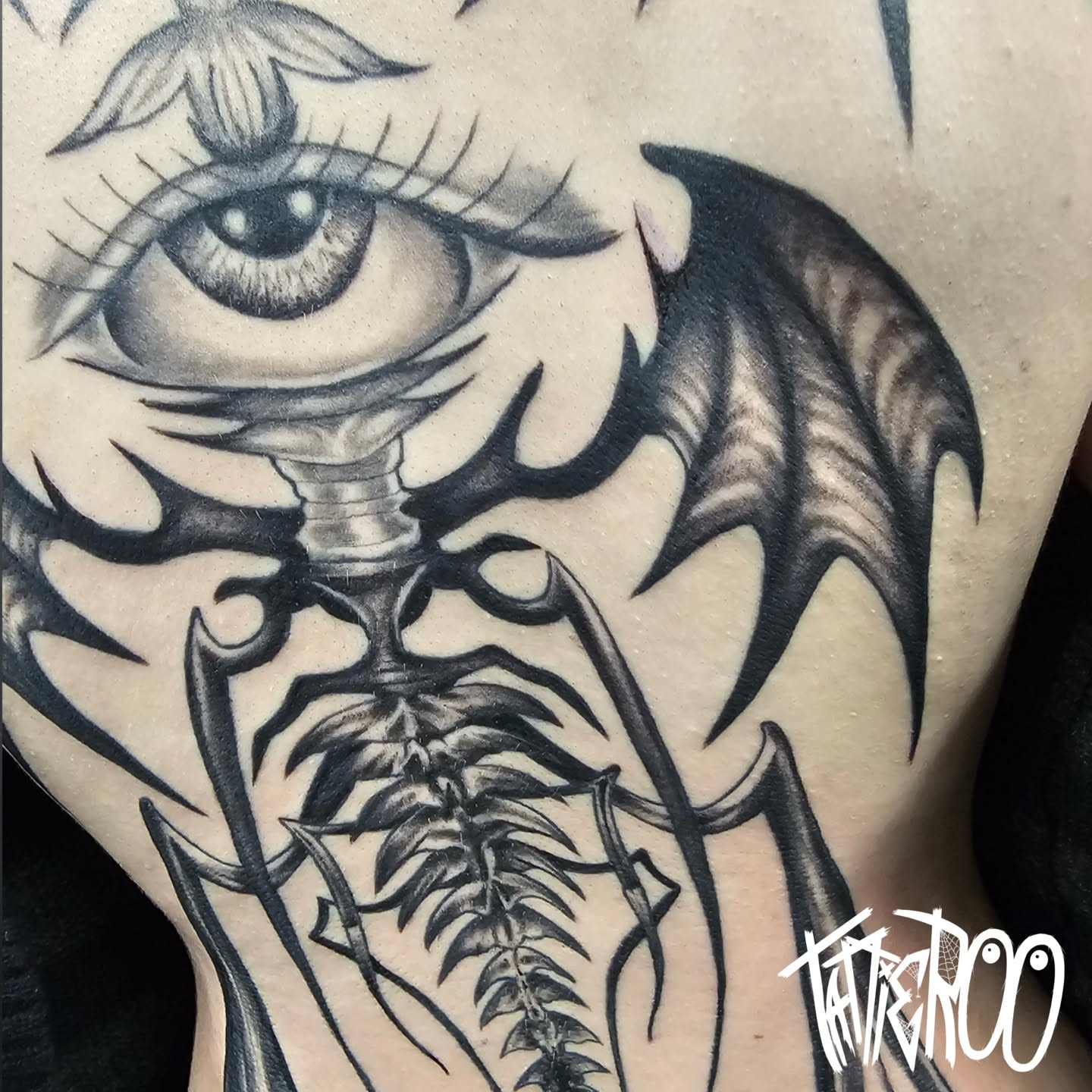 Tattoo by @tattier00 — black_and_grey, realism