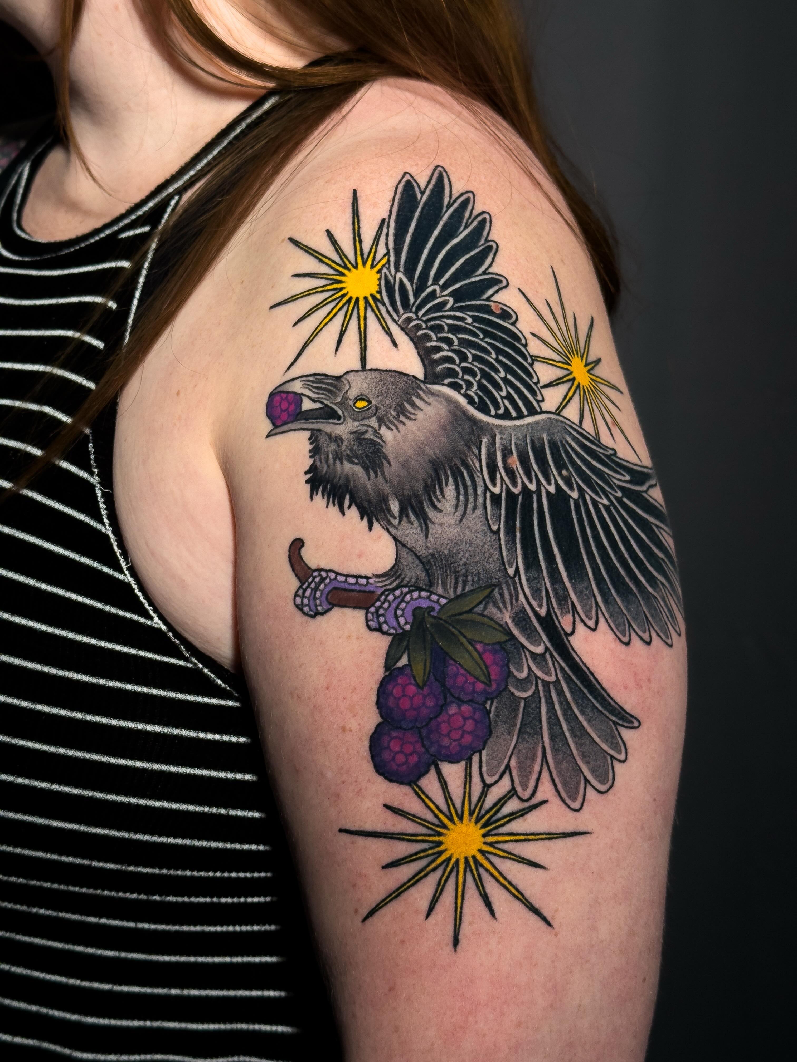 Eagle with grapes American traditional tattoo on the shoulder by Igor Puente