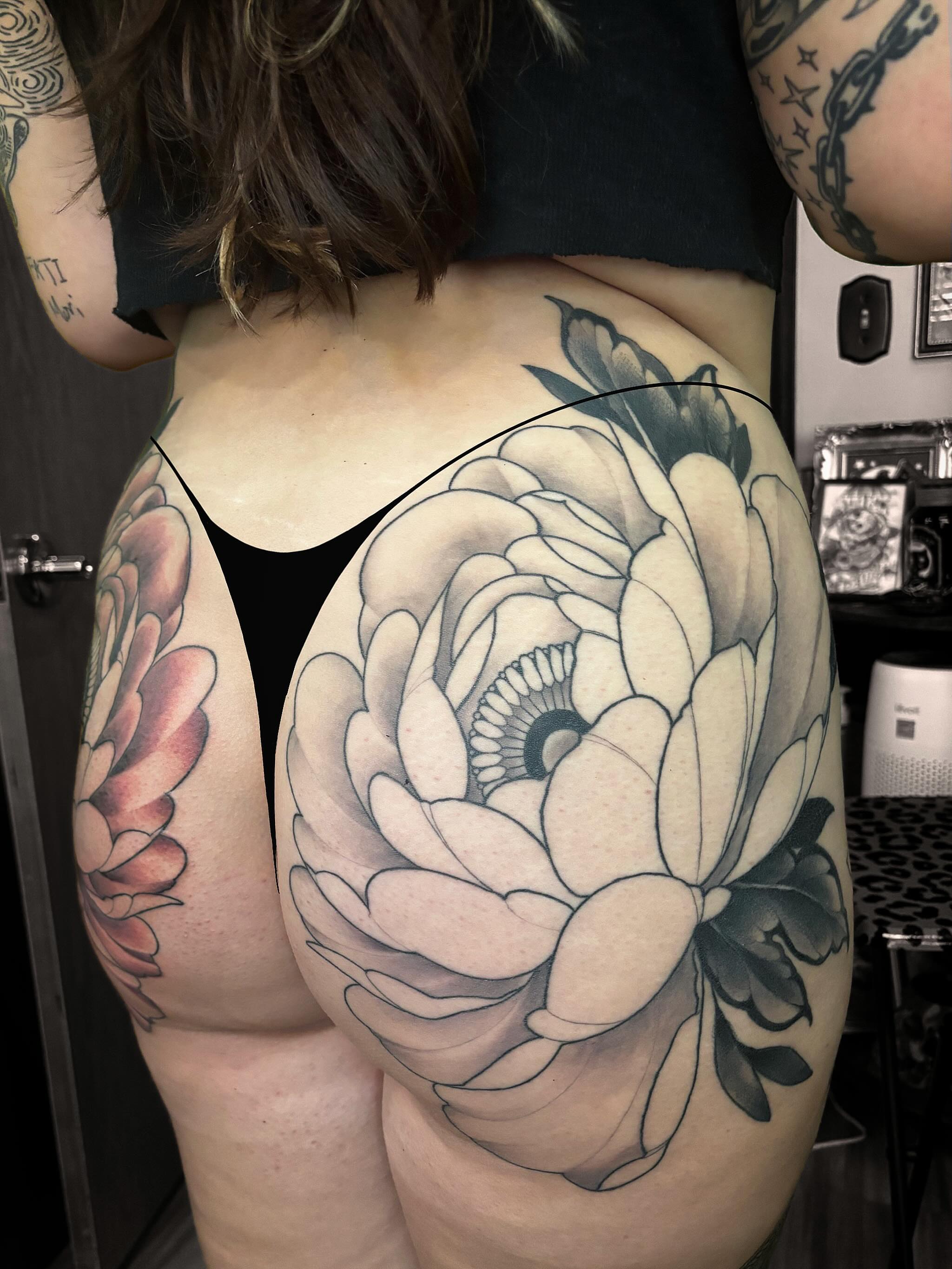Peony black and grey tattoo on the thigh by Alex