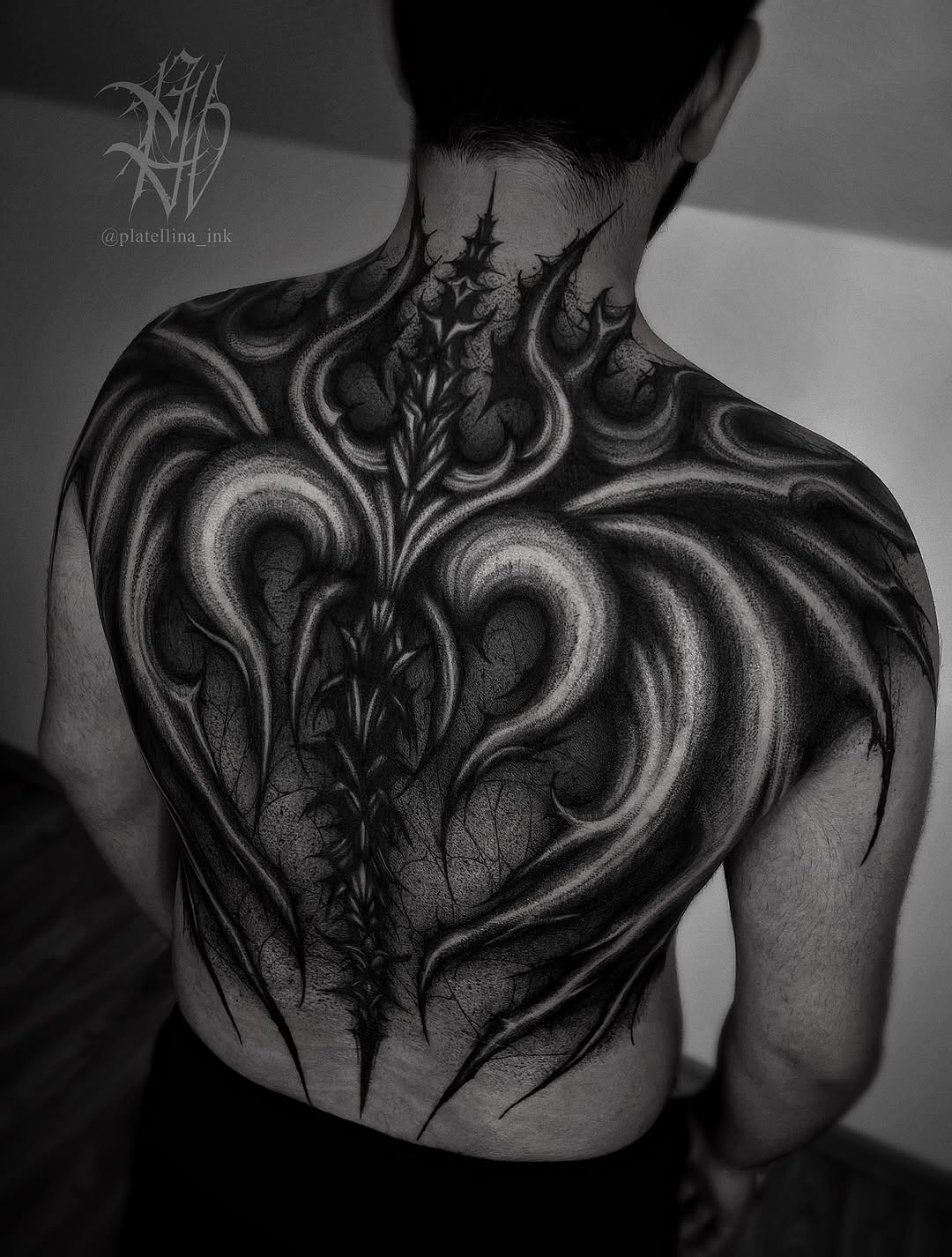 Ornamental dragon back piece cyber sigilism tattoo on the back by Dark Gothic Tattoo