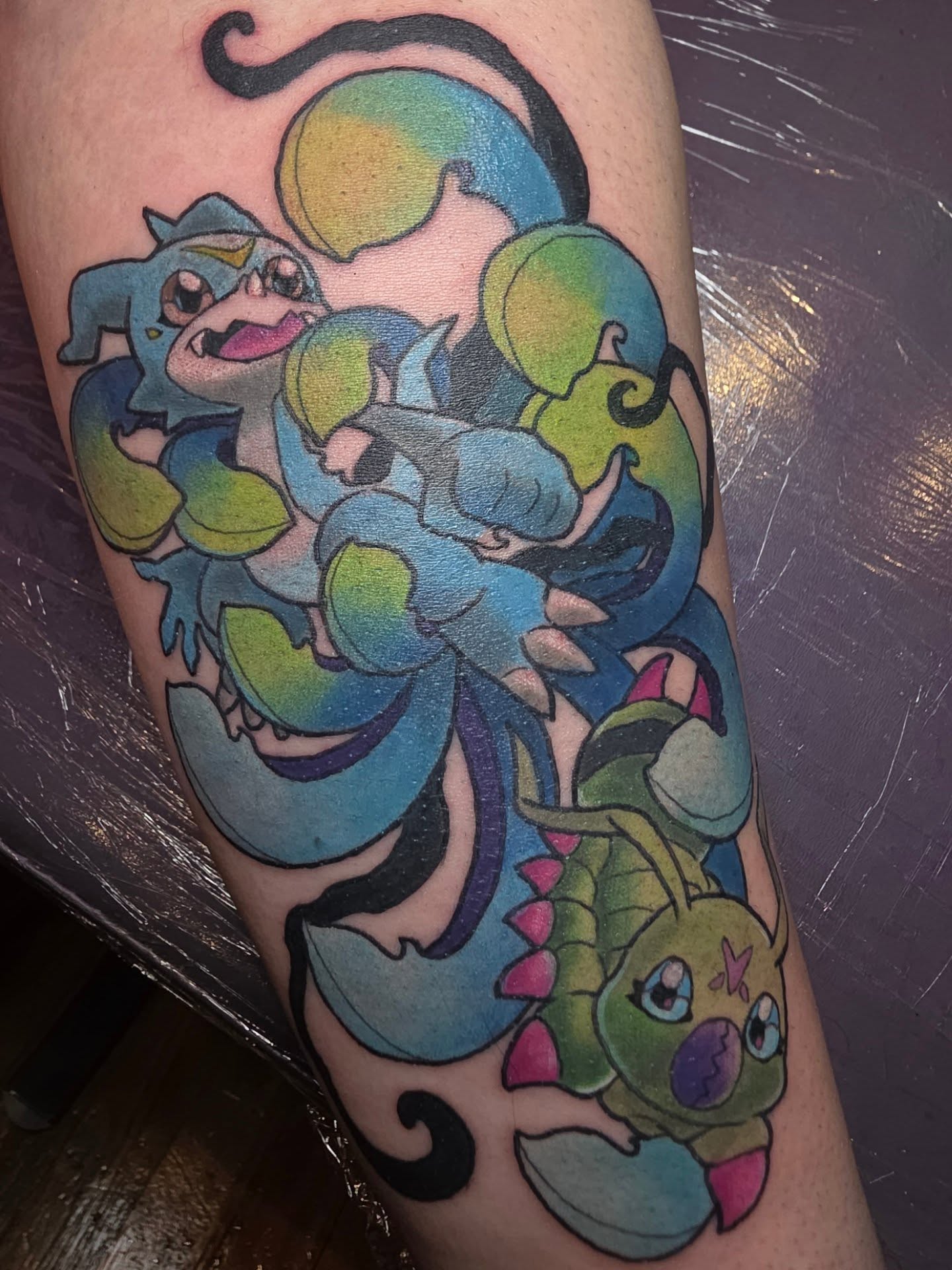 Octopus and turtle new school tattoo on the forearm by Kayla Williams