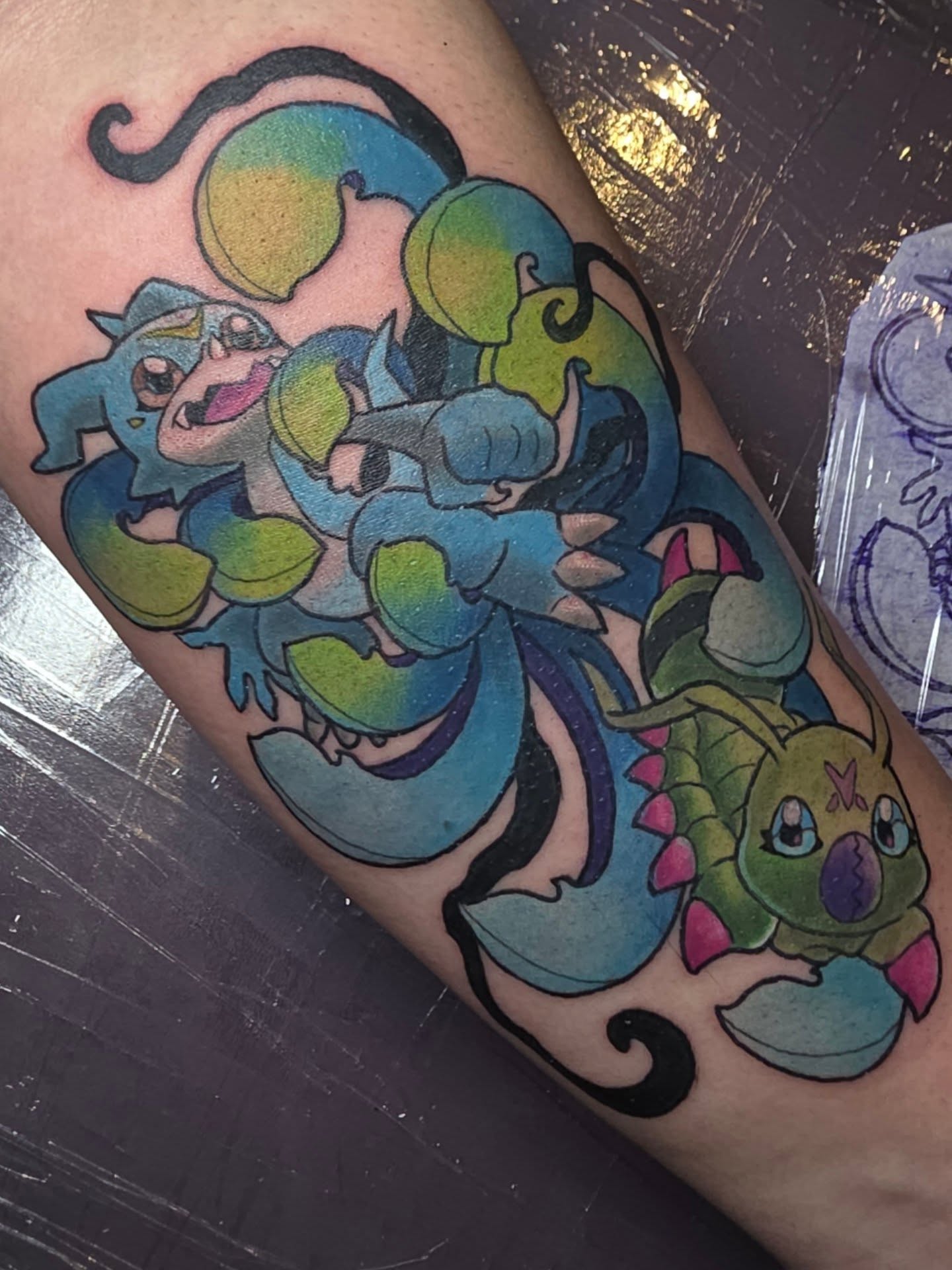 Monster and creature new school tattoo on the forearm by Kayla Williams