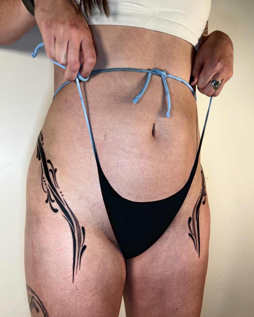 Tribal design tribal tattoo on the thigh by Elisa