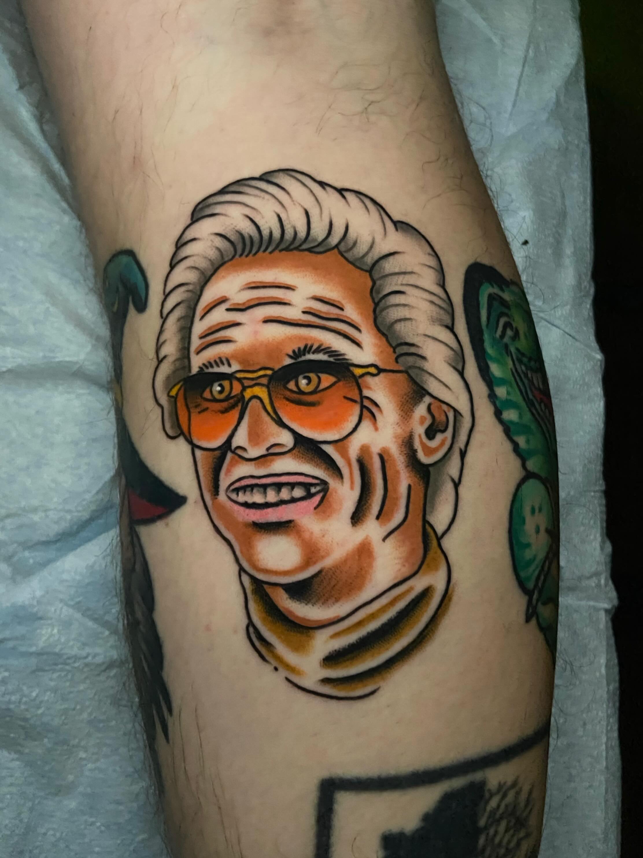Portrait American traditional tattoo on the forearm by Chris Bishop