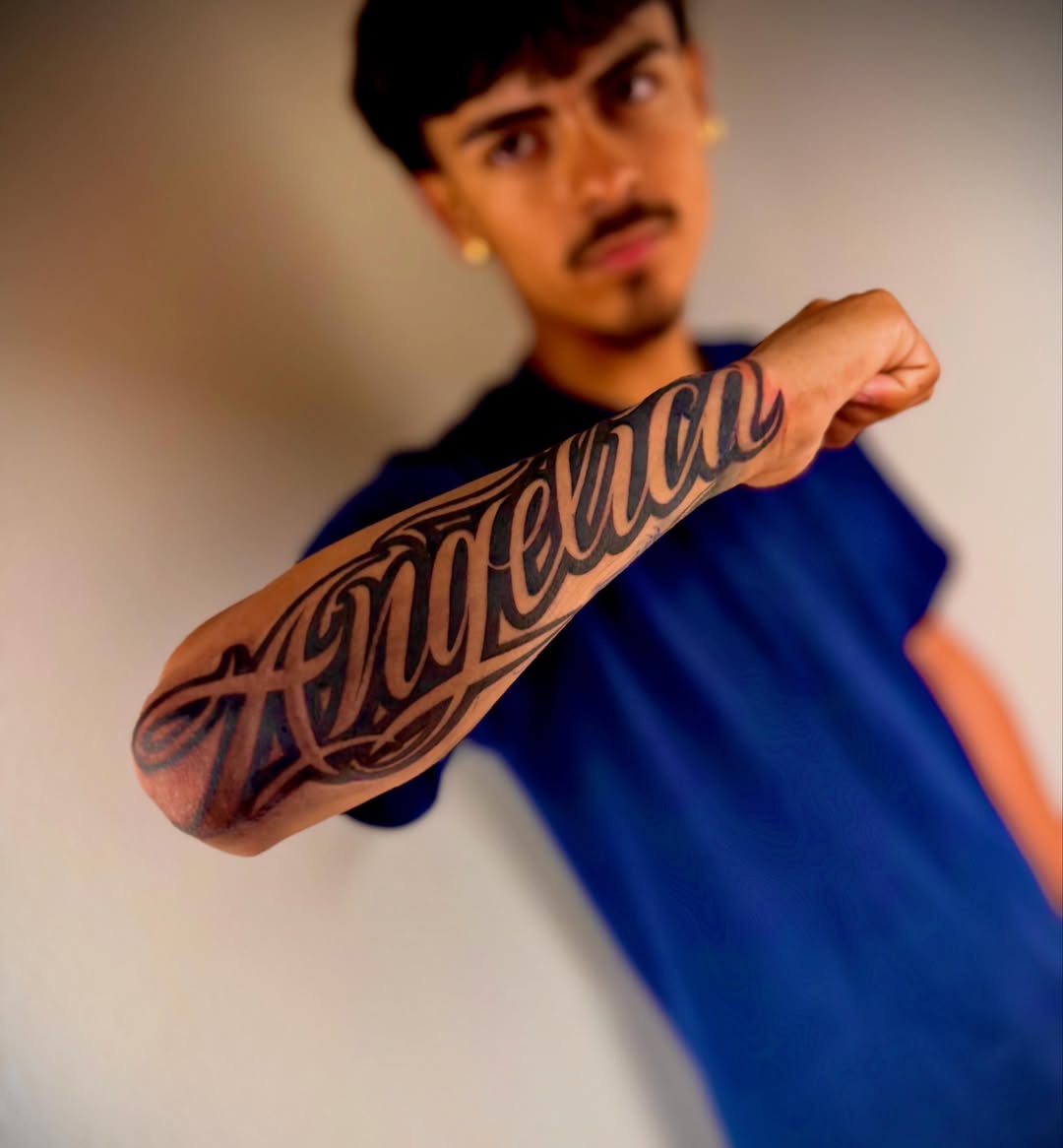 Tattoo by @lalo_inktattoos — lettering_script