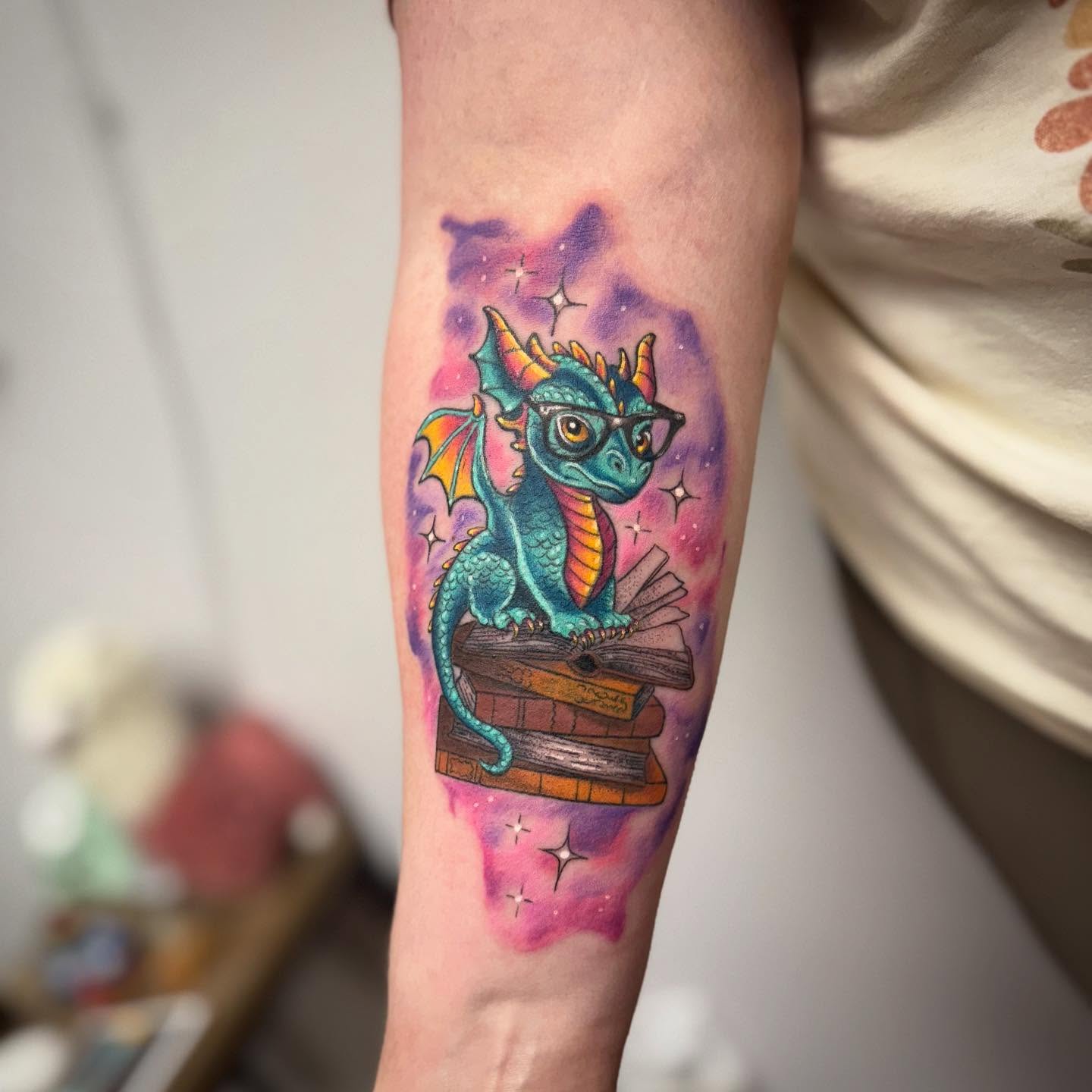 Dragon watercolor tattoo on the forearm by KT