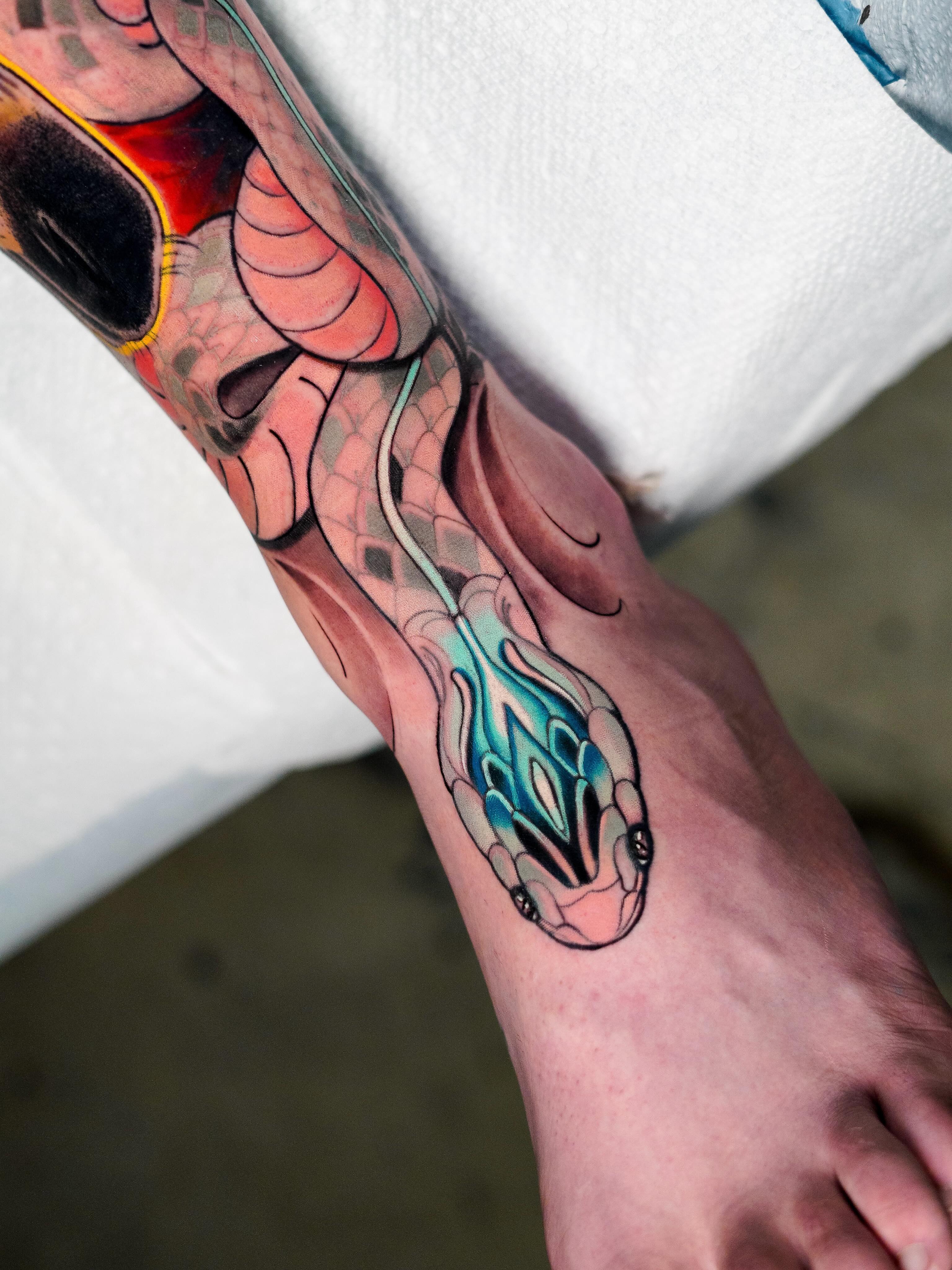 Snake new school tattoo on the forearm by Andres Acevedo, Denver, Colorado