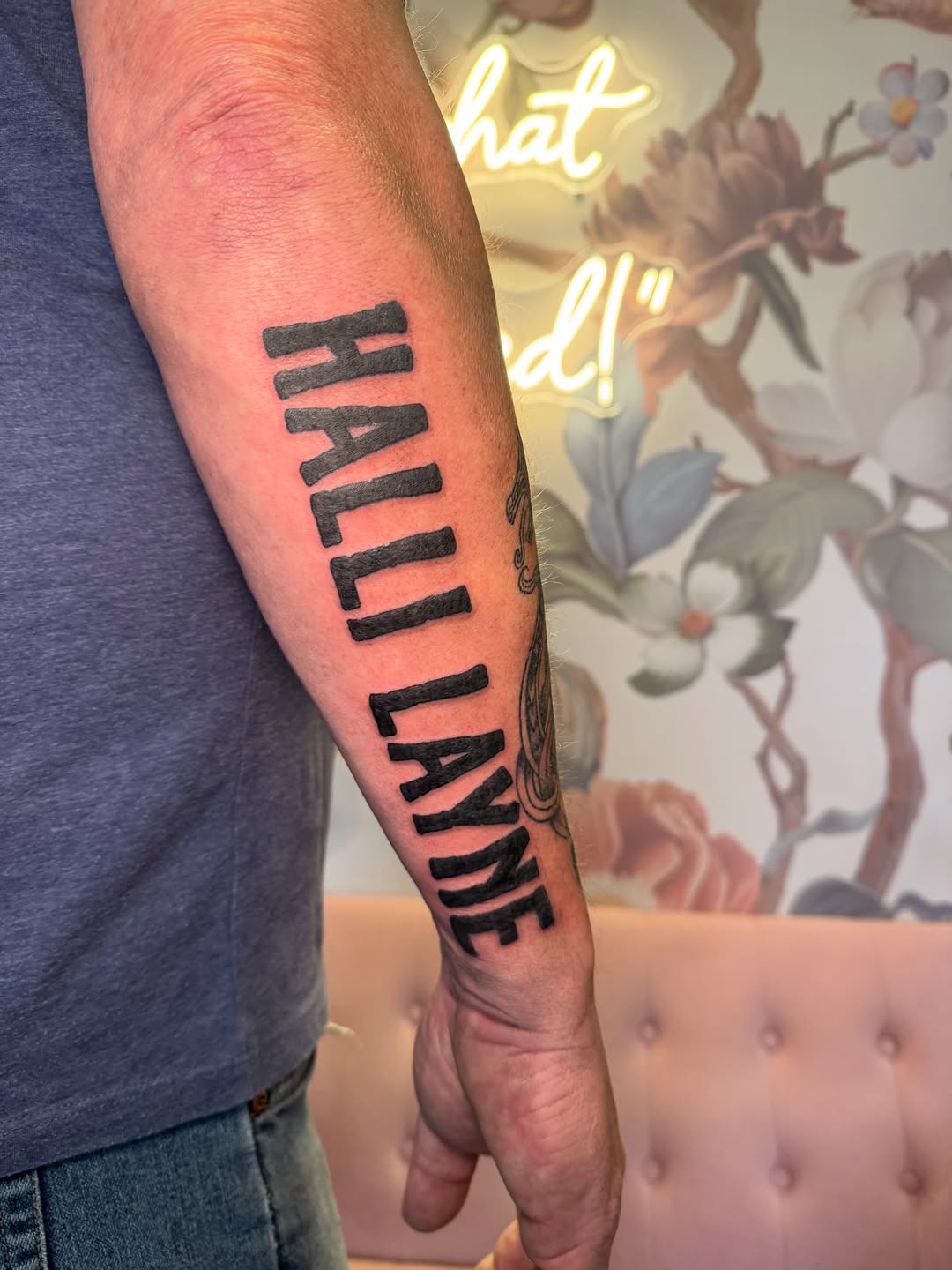 Name tattoo tattoo on the forearm by Kinzi Brown