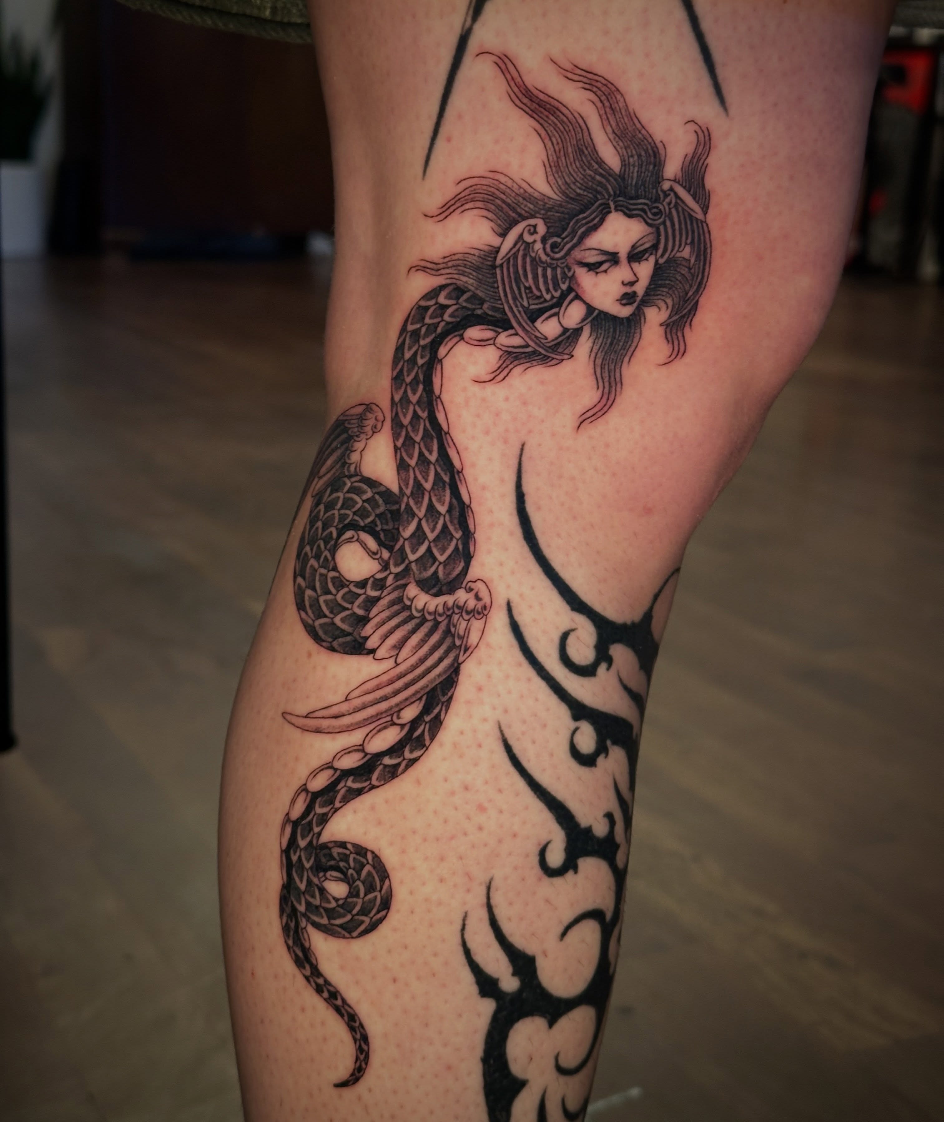 Mermaid realism tattoo on the thigh by Bree Lin