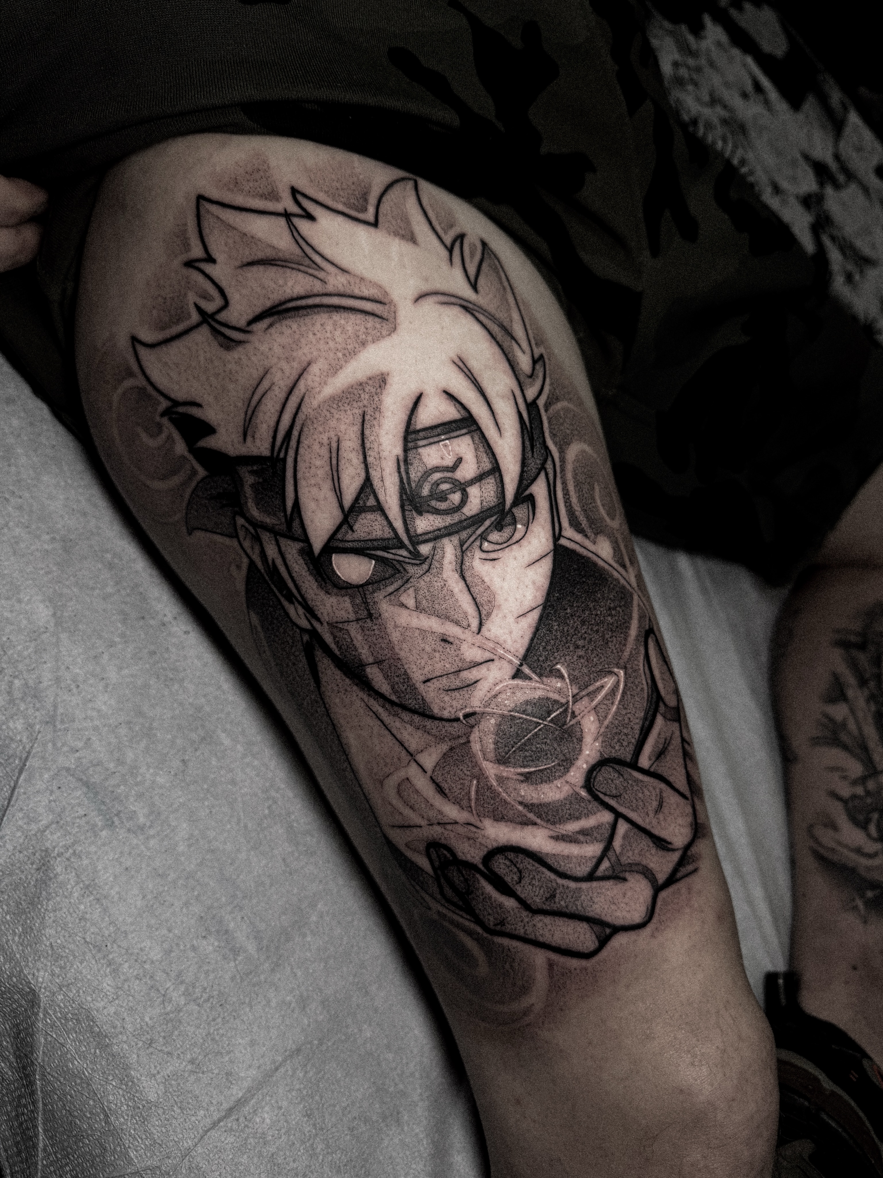 Anime character dotwork tattoo on the thigh by Dane Bezeau