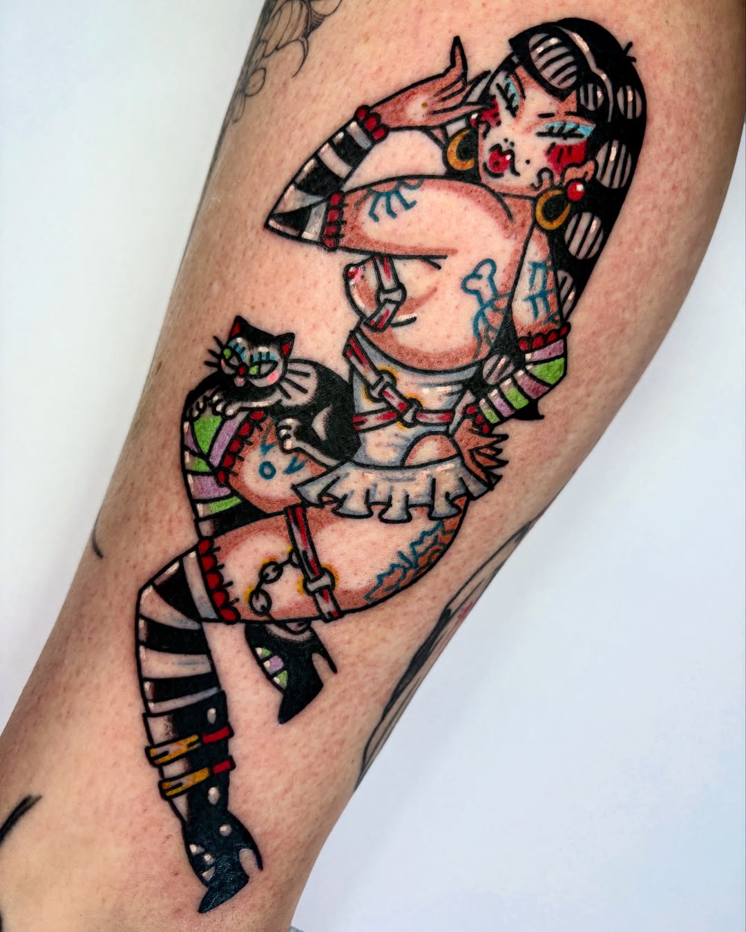 Woman riding cat American traditional tattoo on the forearm by Bella