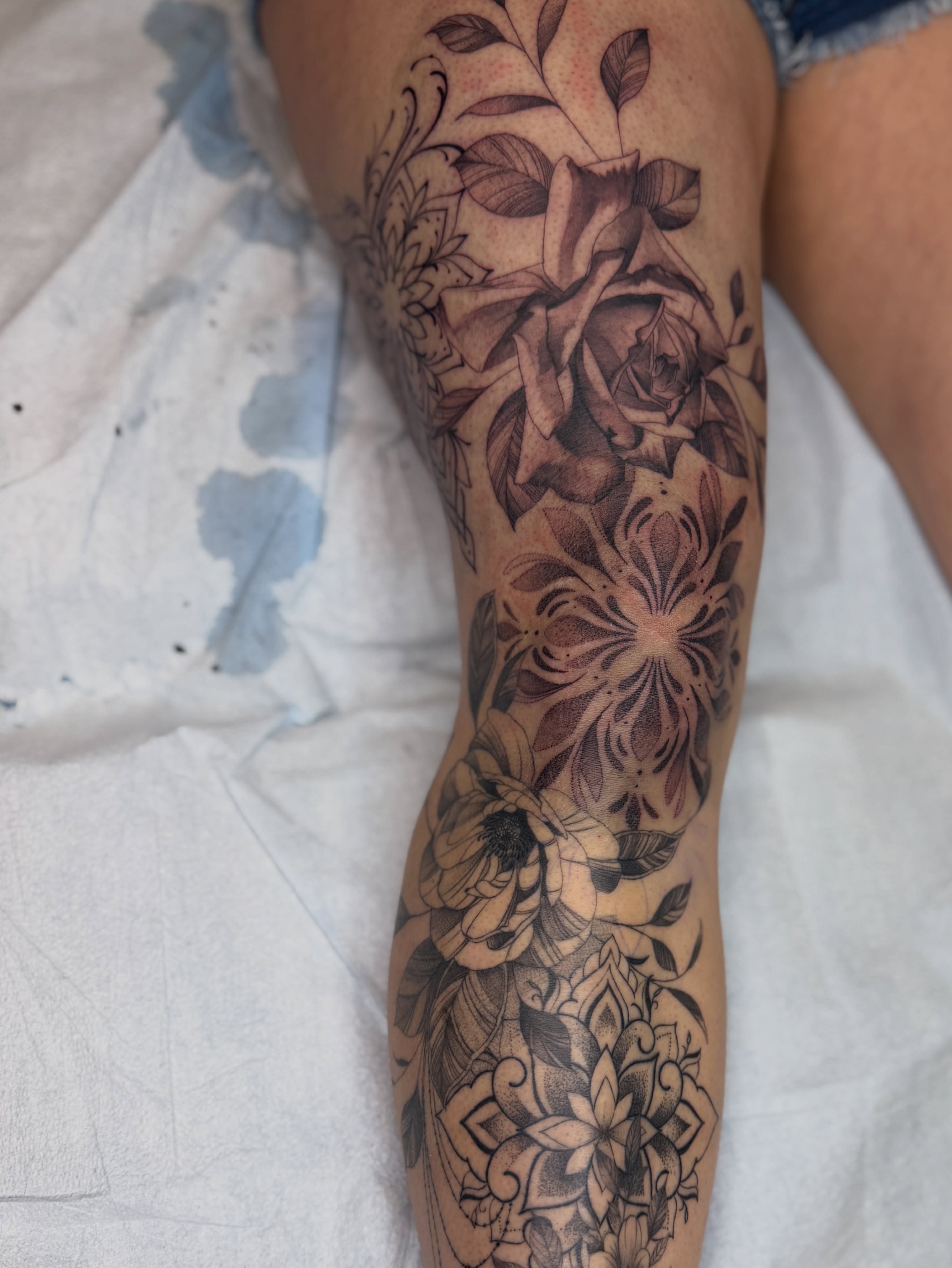 Floral bouquet dotwork tattoo on the forearm by Melissa Rose Moya