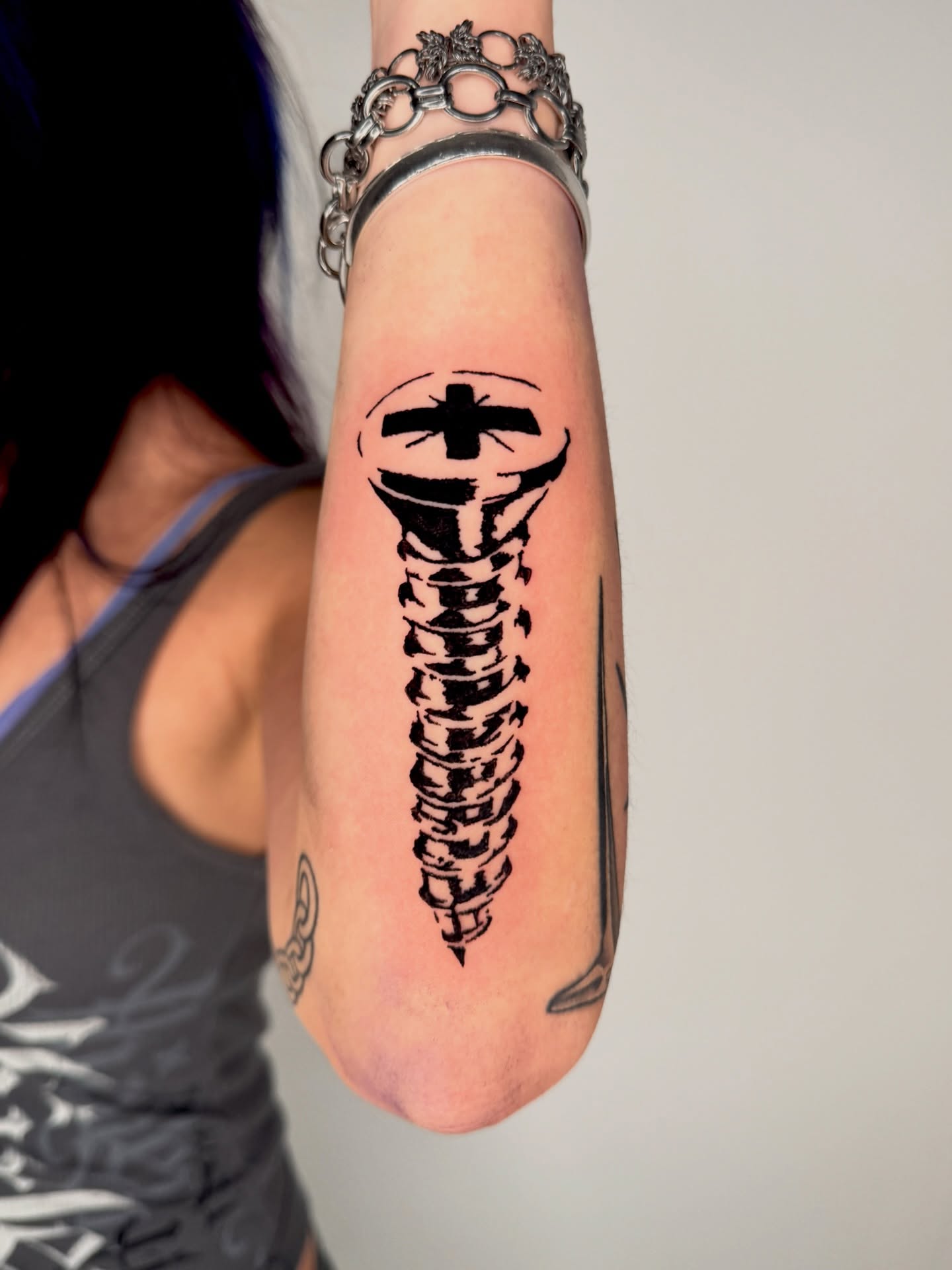 Screw black and grey tattoo on the forearm by 𝔠𝔲𝔯𝔱𝔦𝔰 ~ tattoo artist