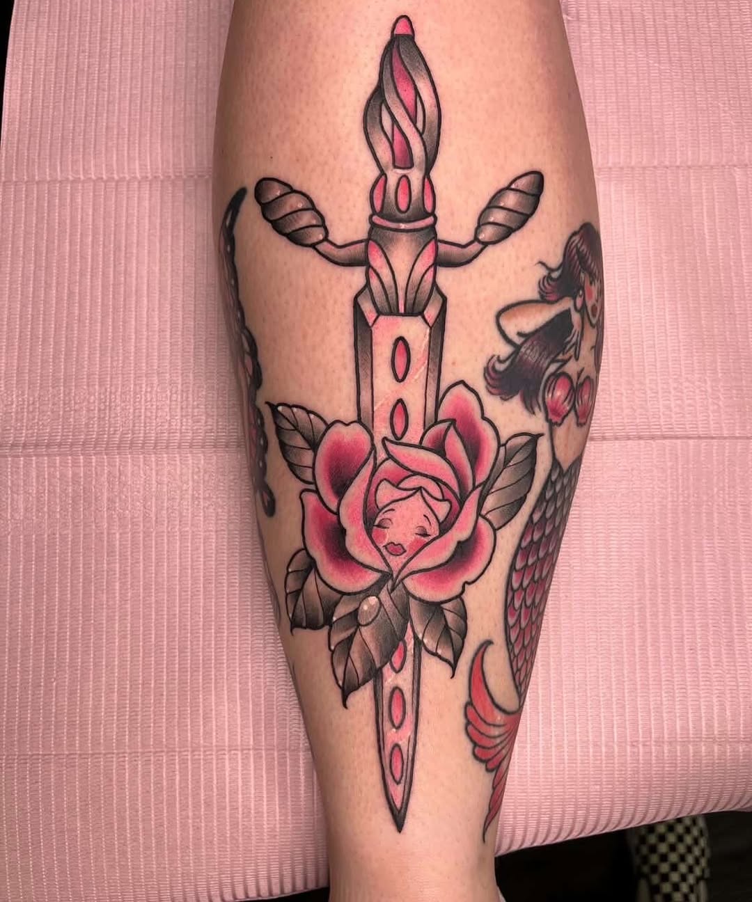 Dagger and rose with face American traditional tattoo on the calf by ๐Miss Ash Masloff (Mrs.Waritz)๐
