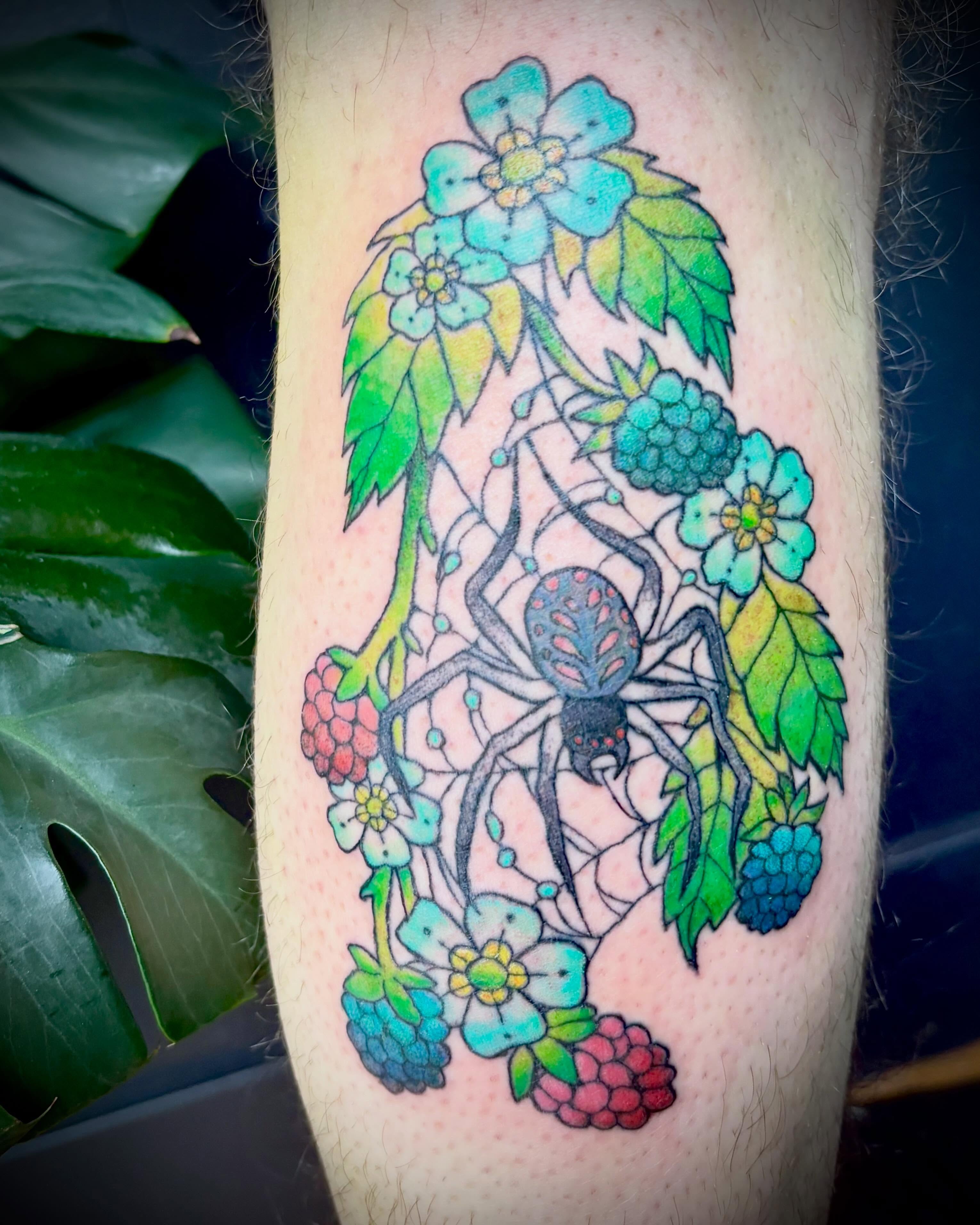 Spider and floral arrangement dotwork tattoo on the forearm by Abby Ruok, Midvale, Utah