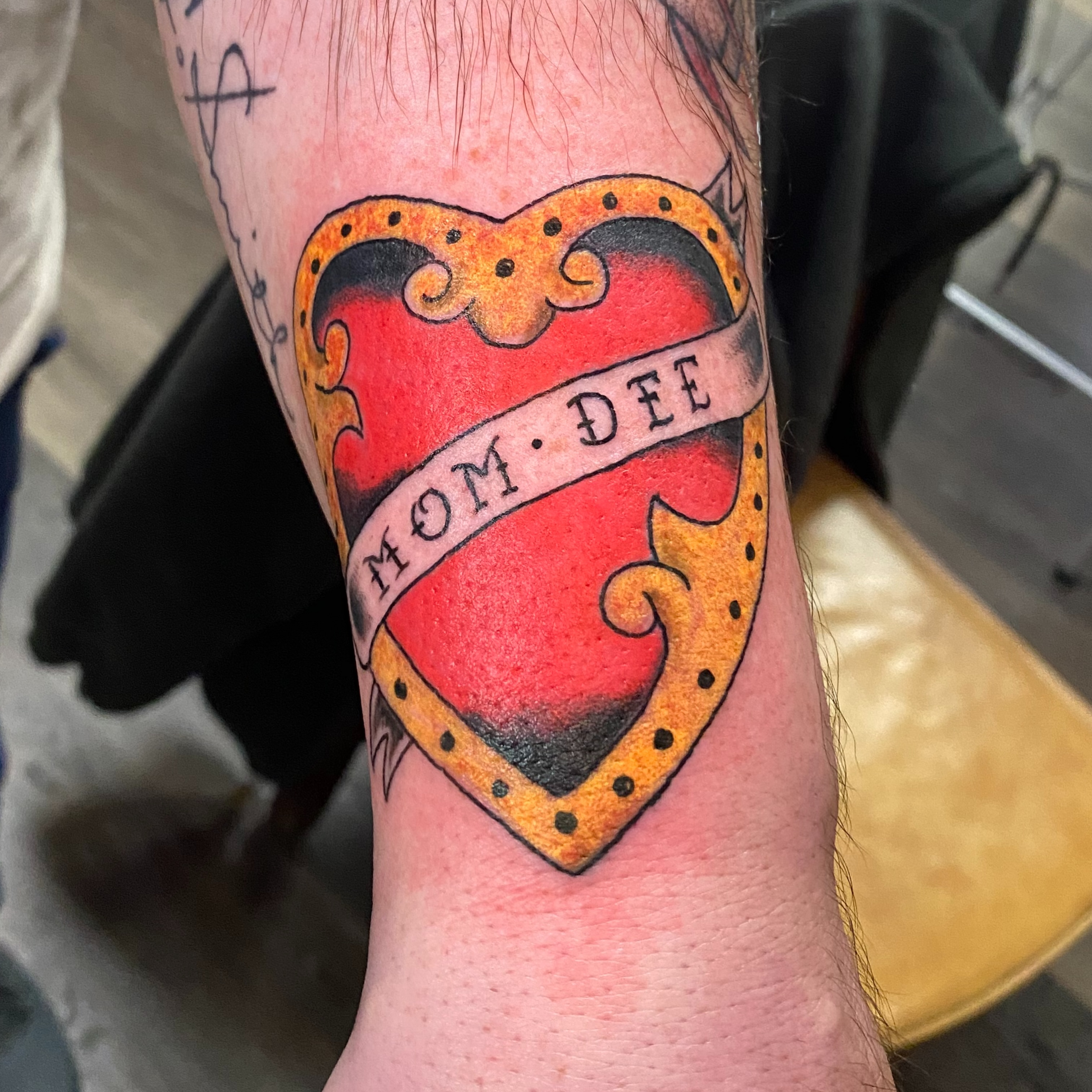 Heart with ribbon American traditional tattoo on the forearm by Giuseppe T.C.