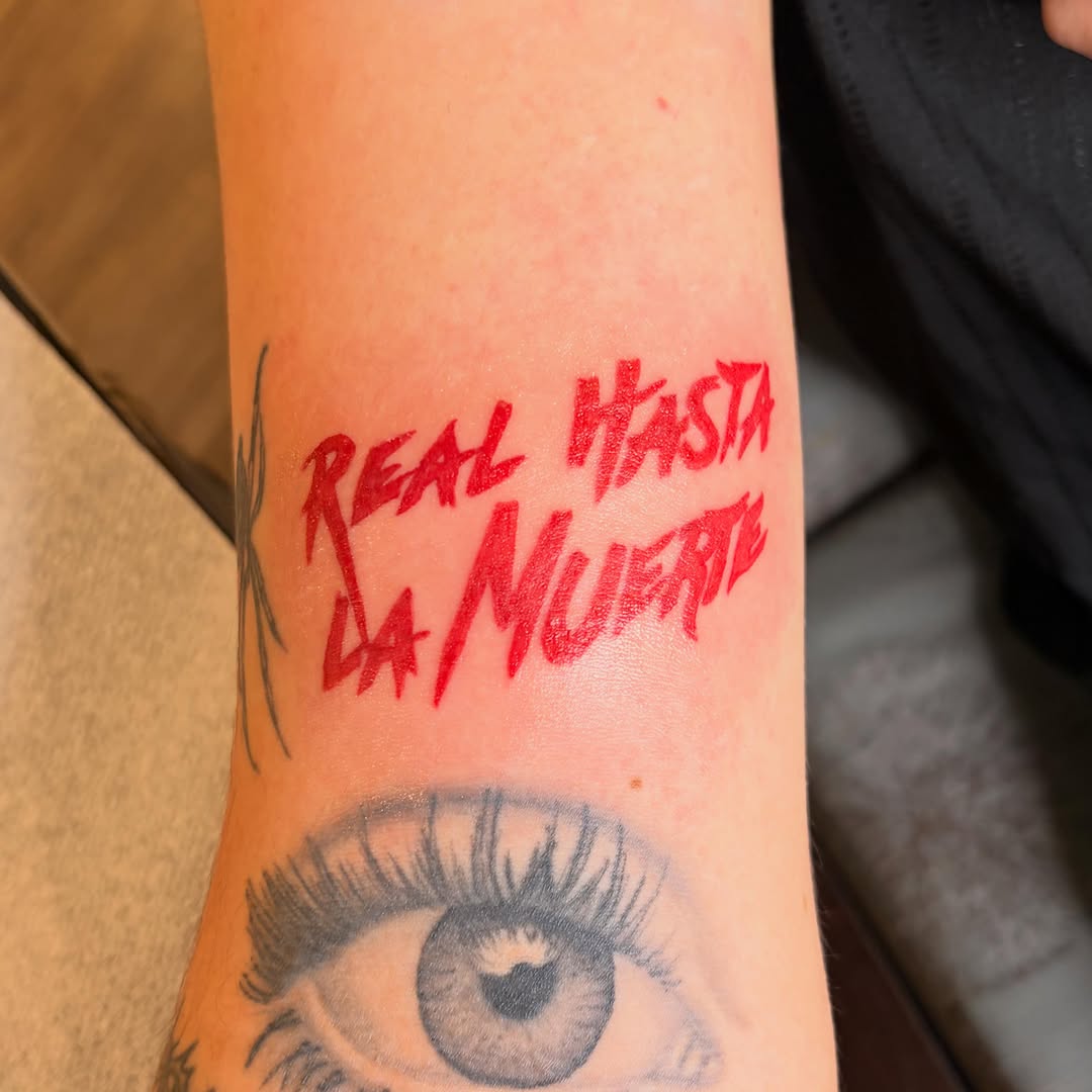Script lettering tattoo on the forearm by CmoreInk