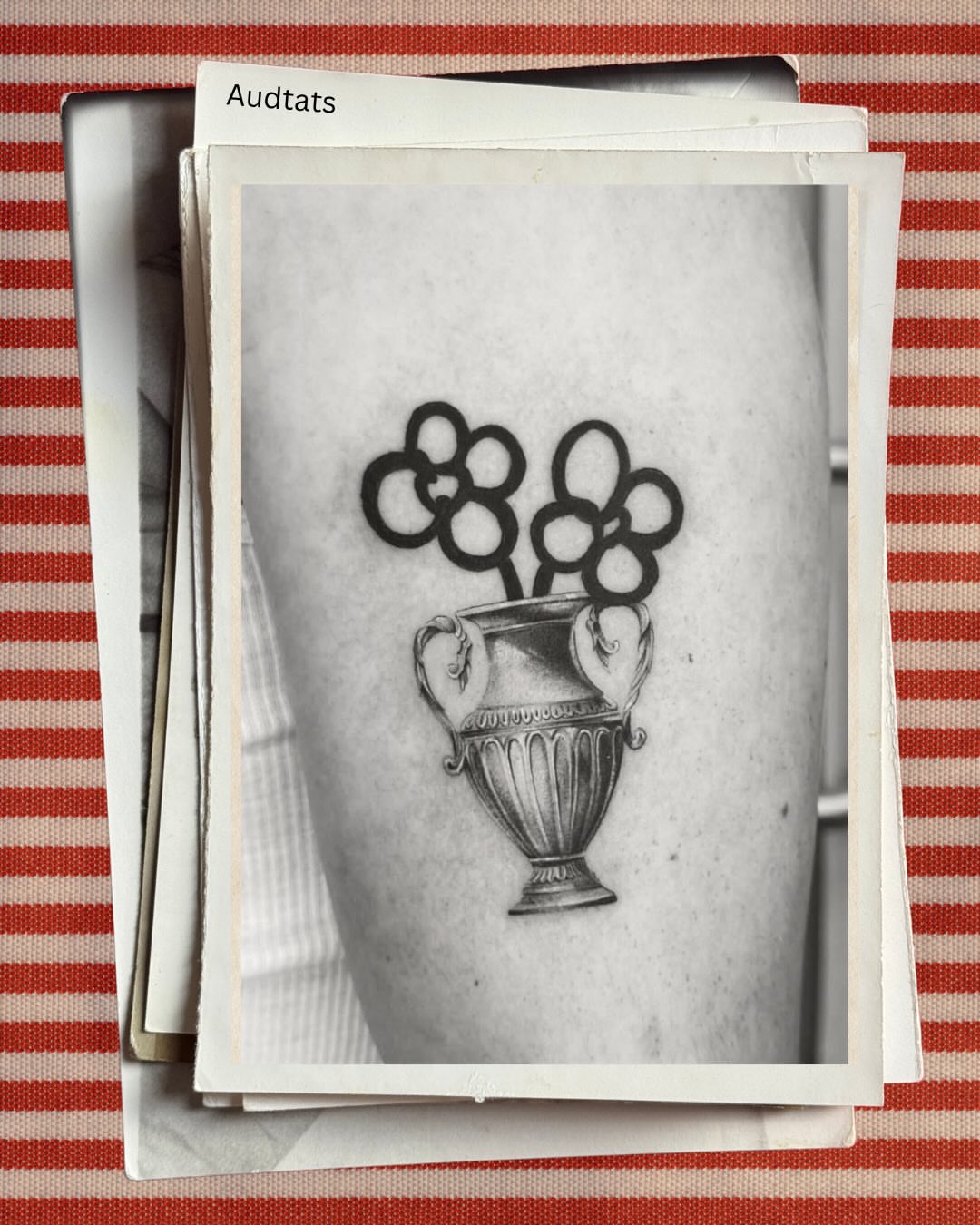 Trophy with Olympic rings black and grey tattoo on the forearm by Lex Lloyd