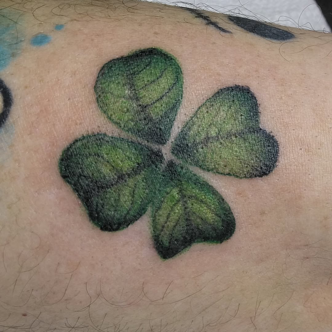 Clover realism tattoo on the forearm by Malynda